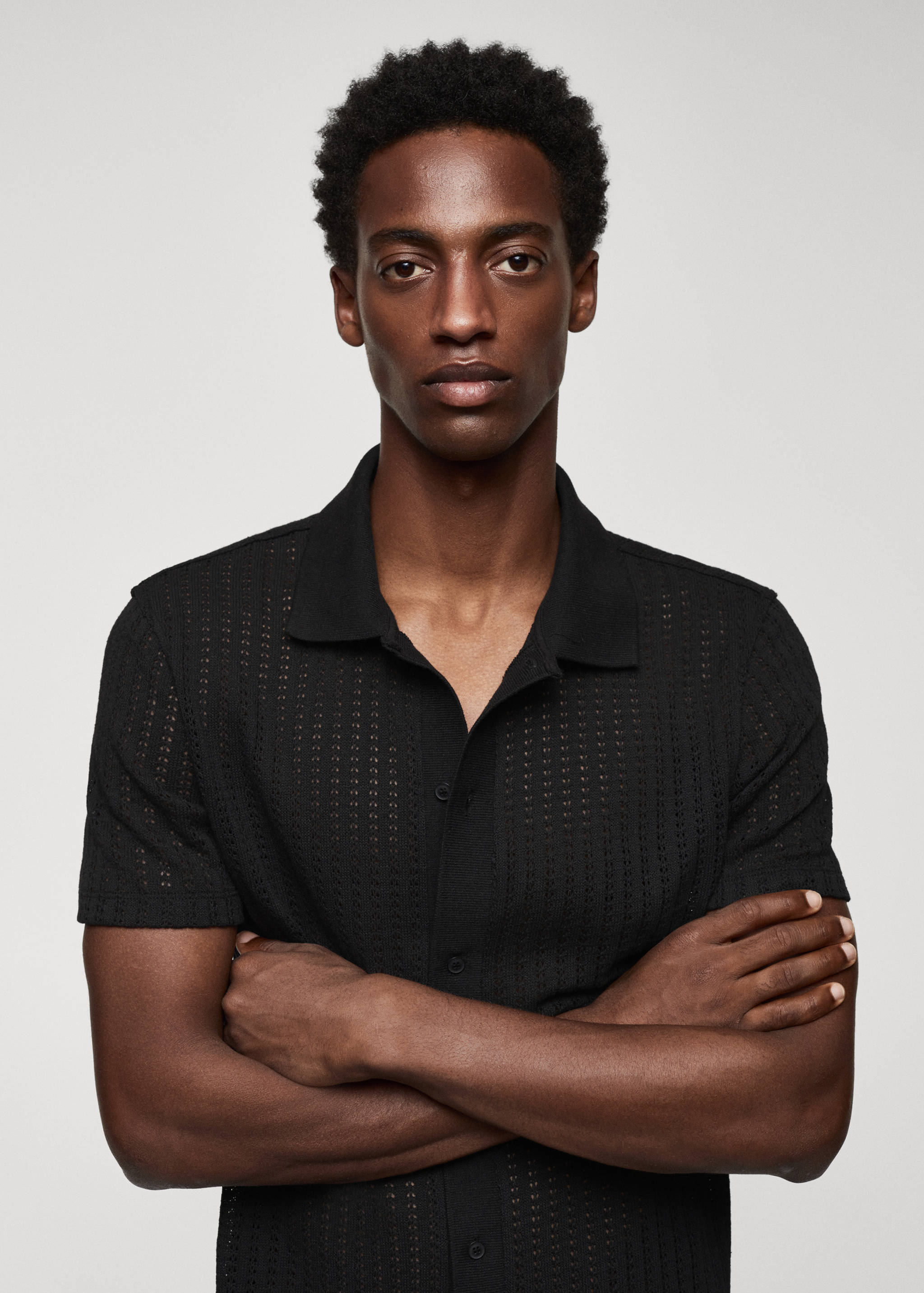 Cotton crochet polo shirt with buttons - Details of the article 1