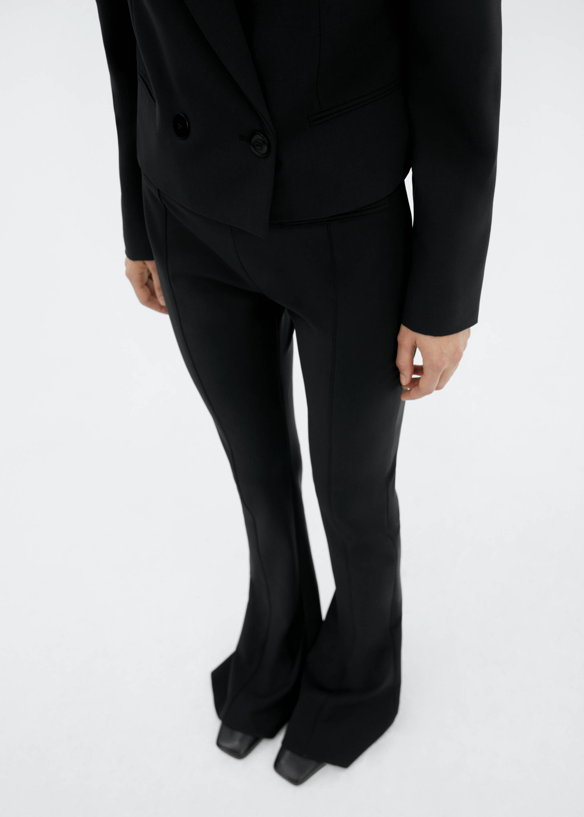 Flared wool trousers - Medium plane, Black. Ref: 57086011-00.