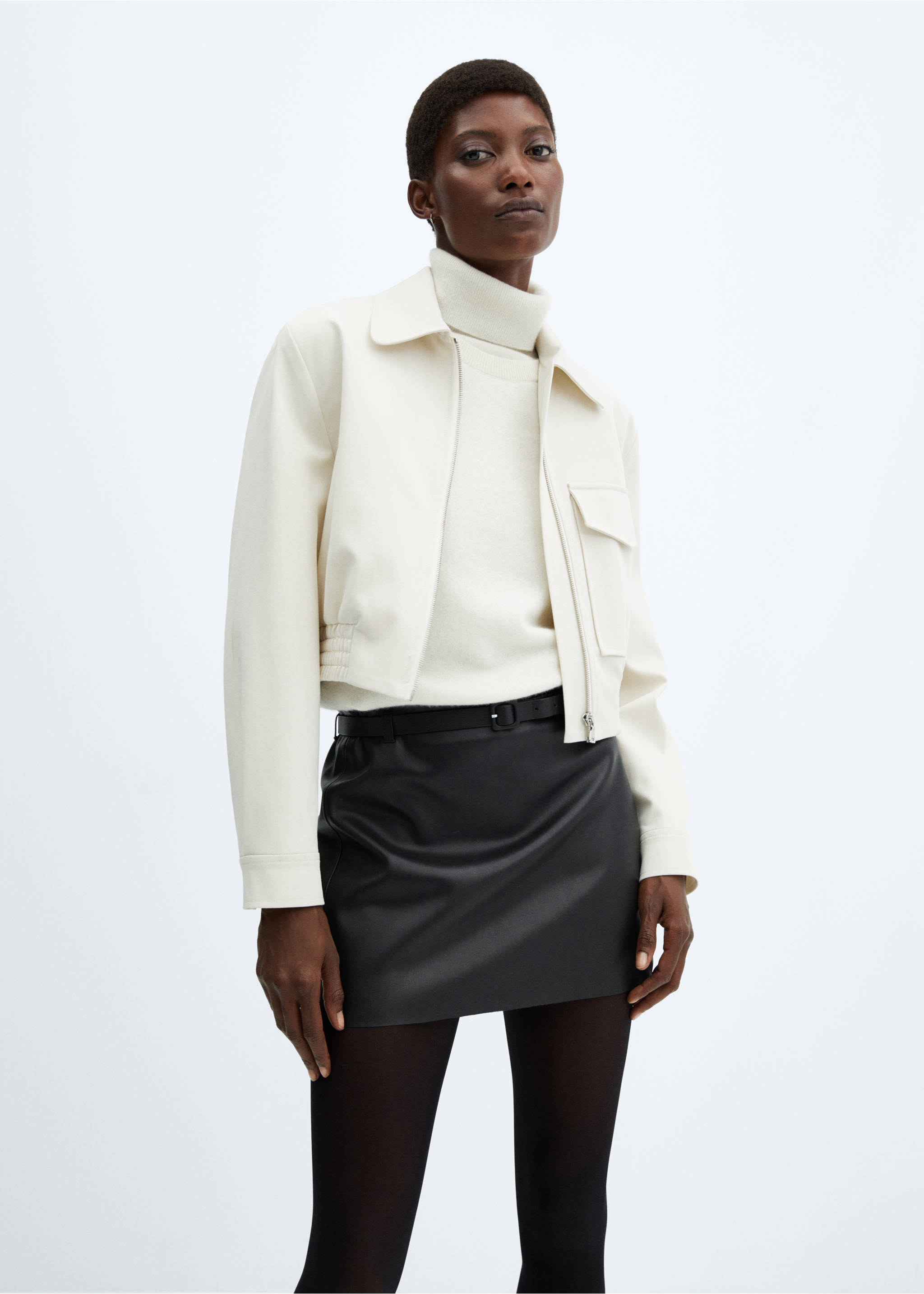 Faux-leather mini-skirt with belt - Details of the article 1, Black. Ref: 57086712-00.