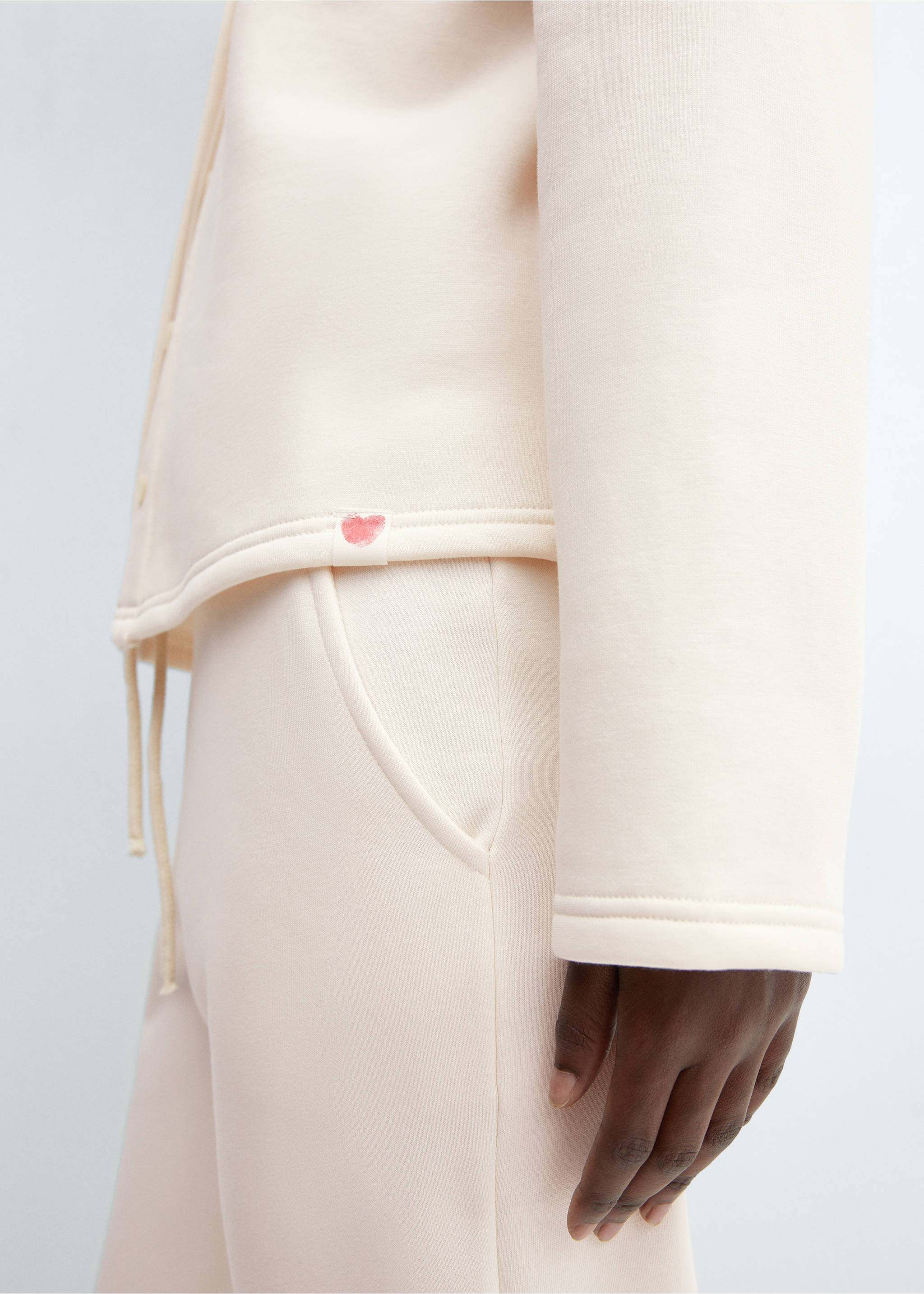 Solidarity buttoned sweatshirt - Details of the article 6, Ecru. Ref: 57087756-00.