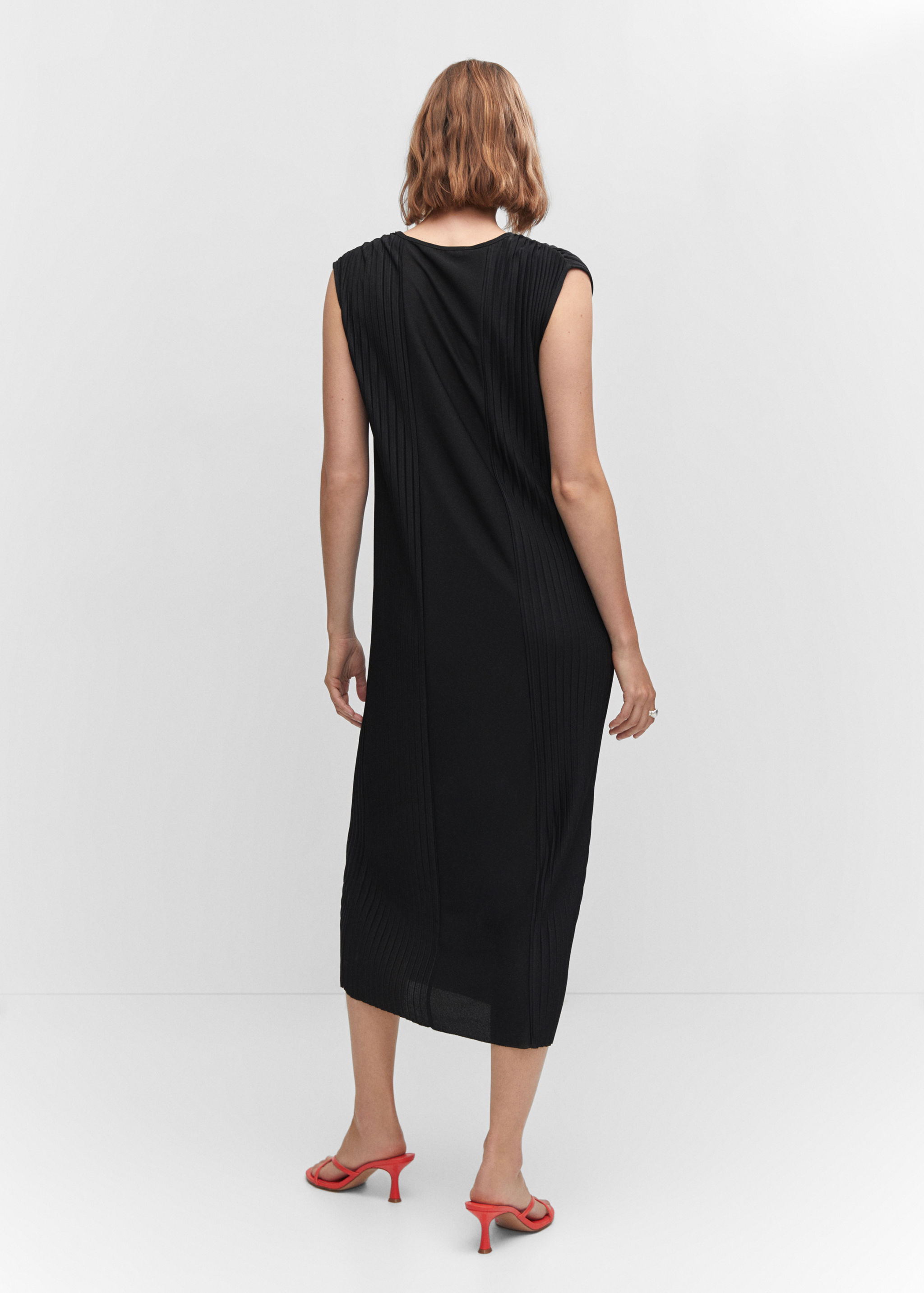 Vestit detalls prisats - Revers de l'article