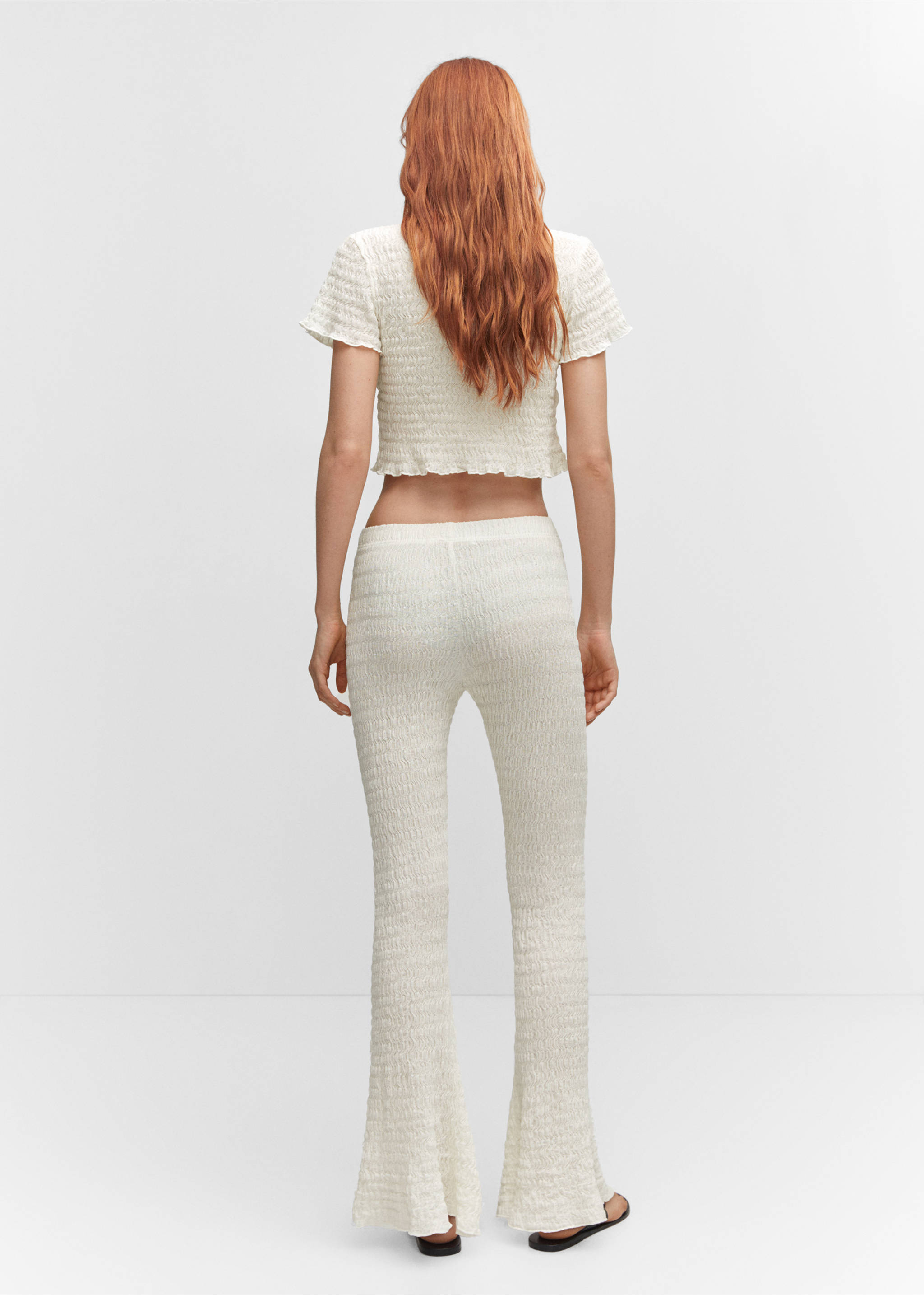 Flared textured trousers - Reverse of the article, Ecru. Ref: 57094013-00.