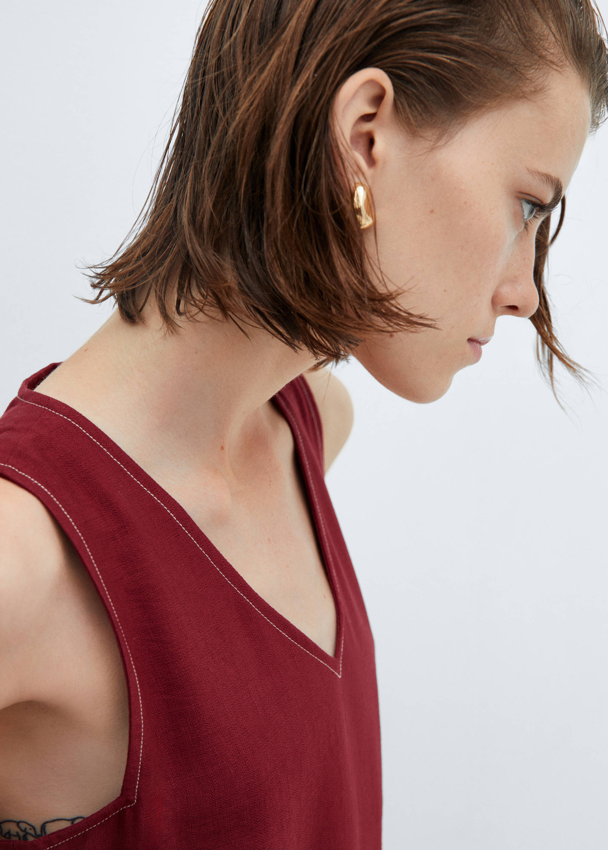 Macacão com costuras de cinto de laço - Pormenor do artigo 1