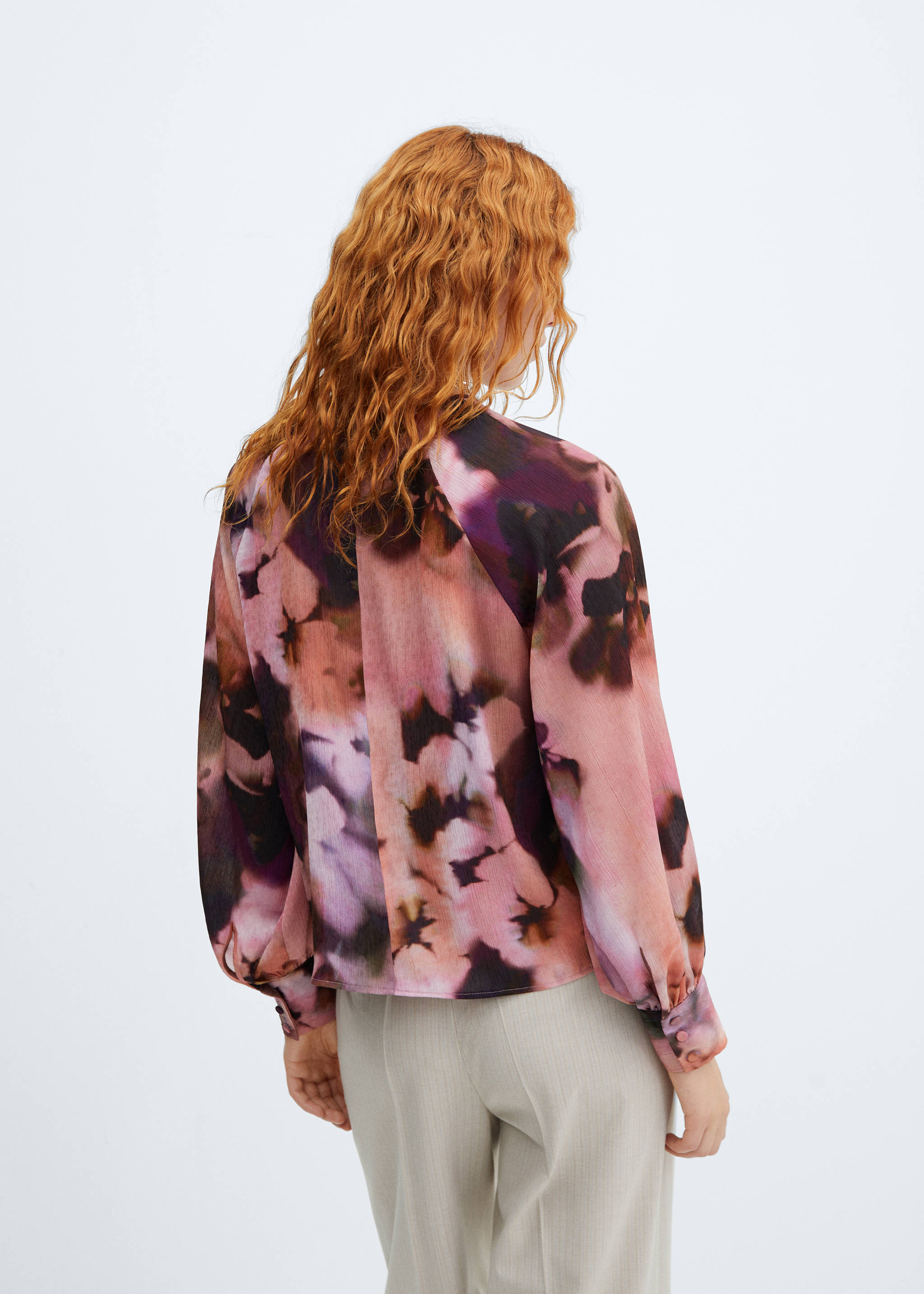 Blusa floral manga abullonada - Reverso del artículo