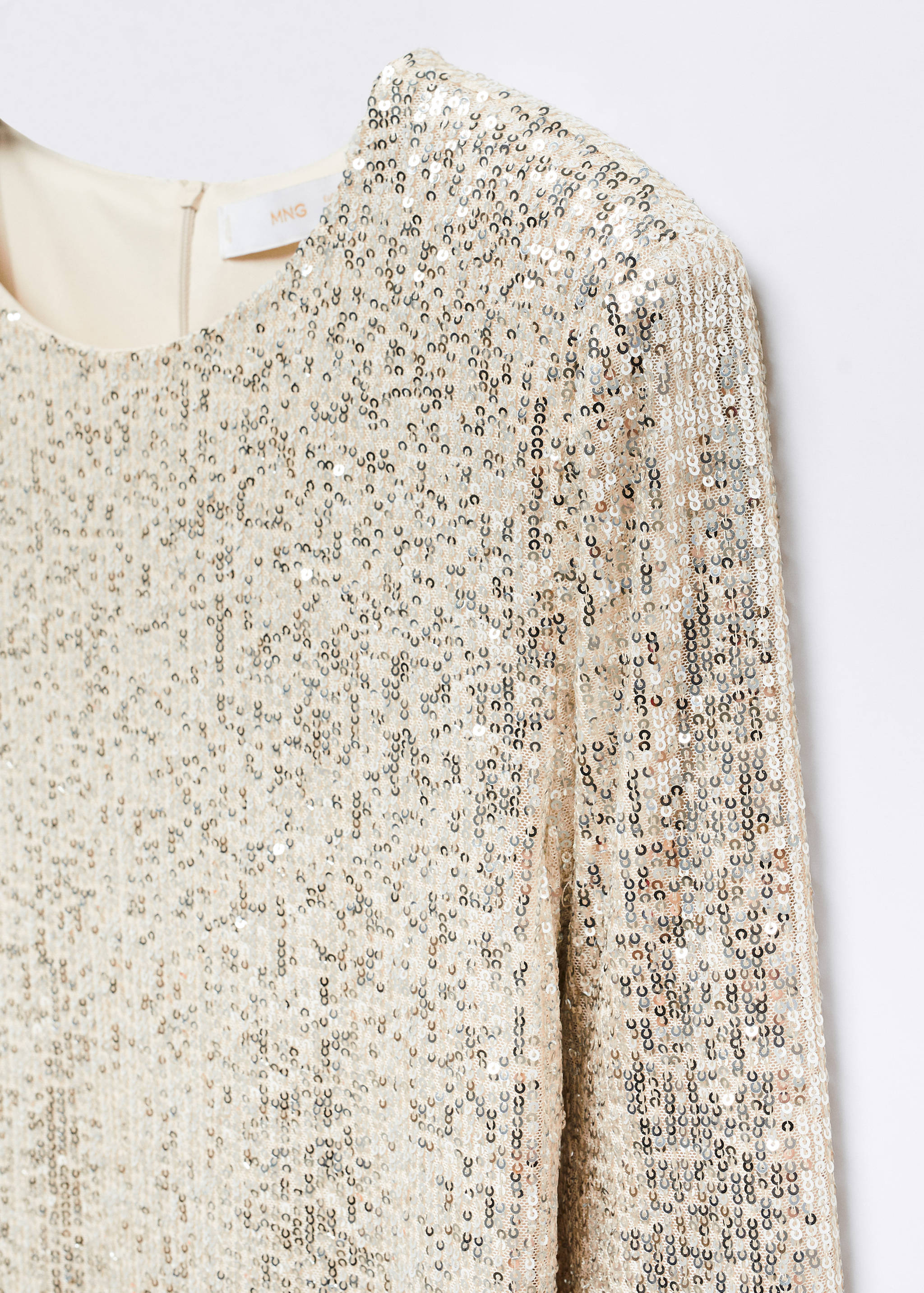 Kort figursydd paljettklänning - Detaljer om artikeln 8