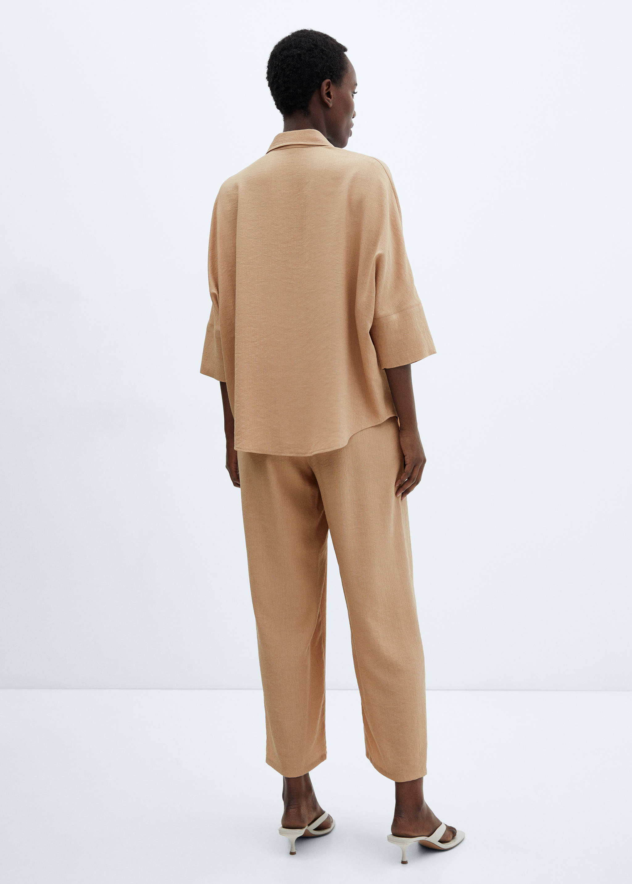 Elastic waist flowy trousers - Reverse of the article