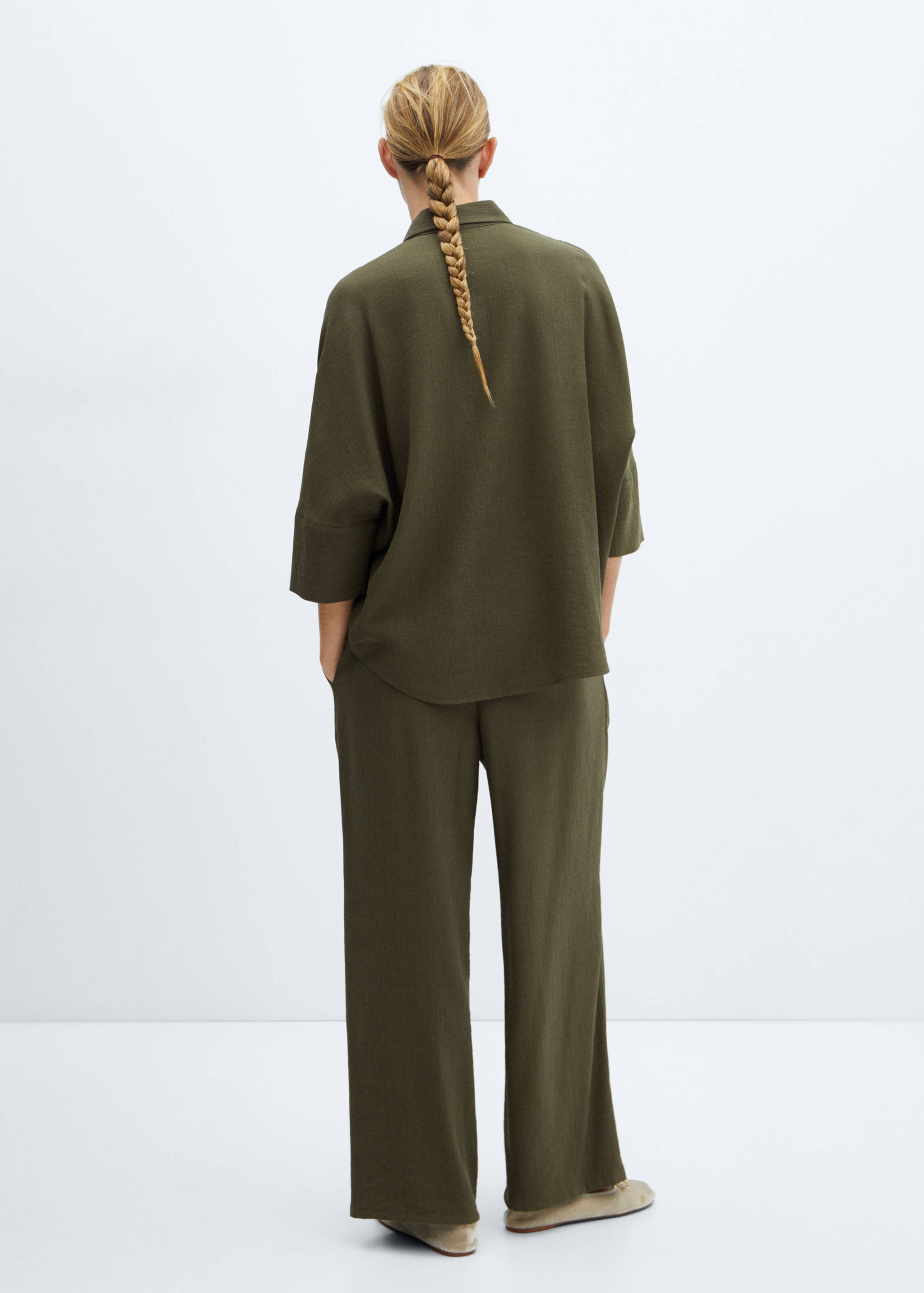 Elastic waist flowy trousers - Reverse of the article
