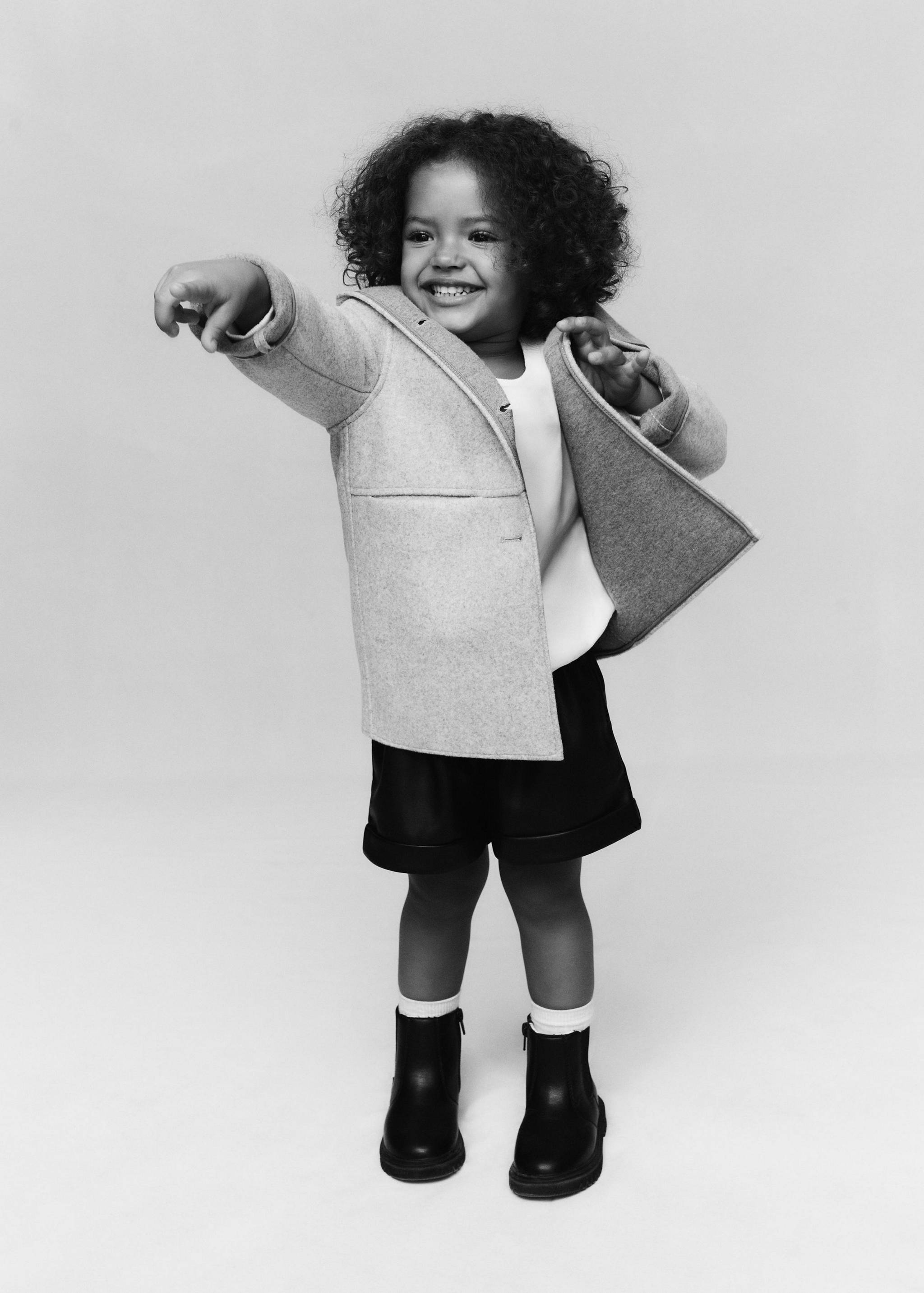 Abric caputxa botons - Detall de l'article 5