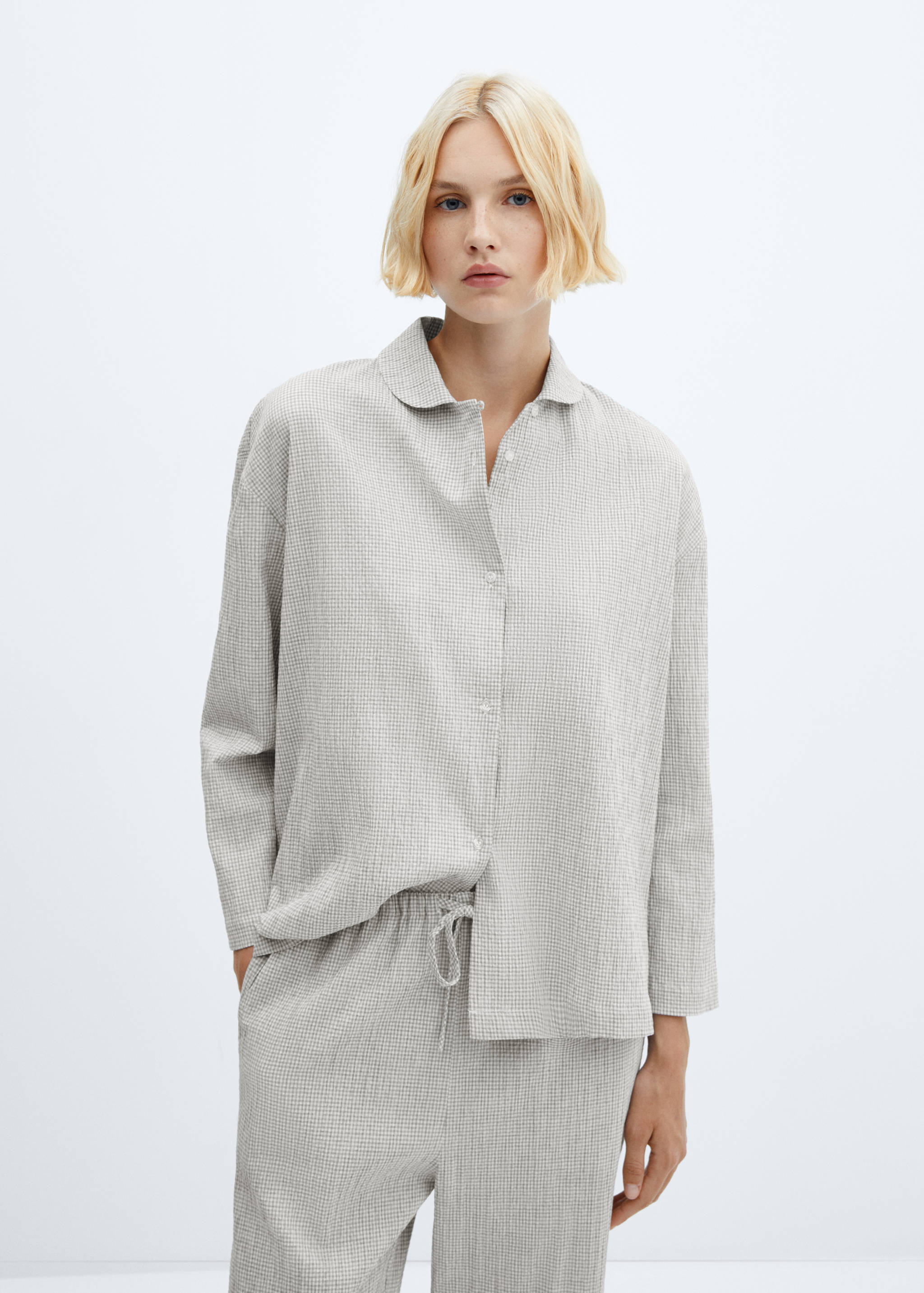 Ginghamrutig bomullspyjamas - Bild av mittparti