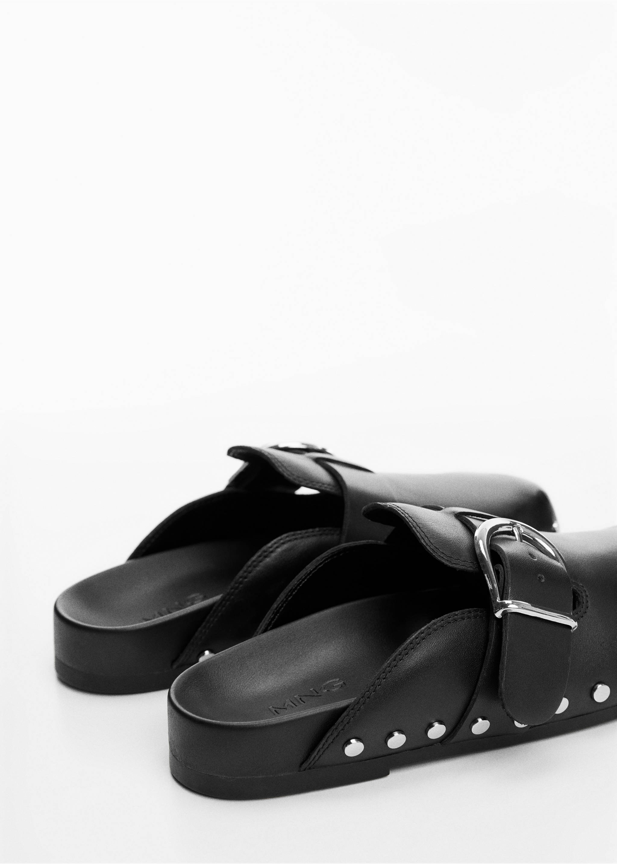 Studded leather clog - Details of the article 1, Black. Ref: 67002532-00.