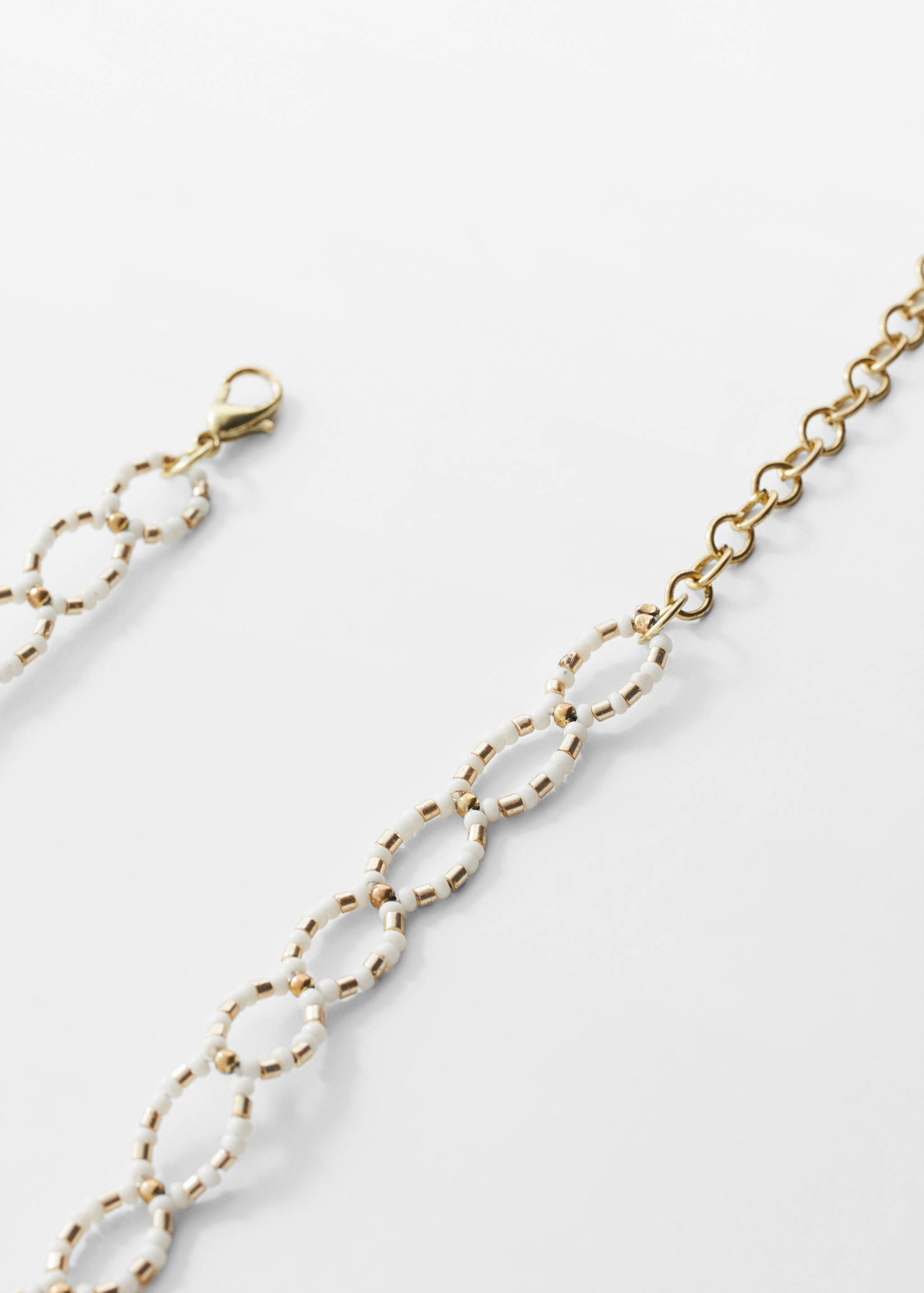 Metal bead necklace - Medium plane