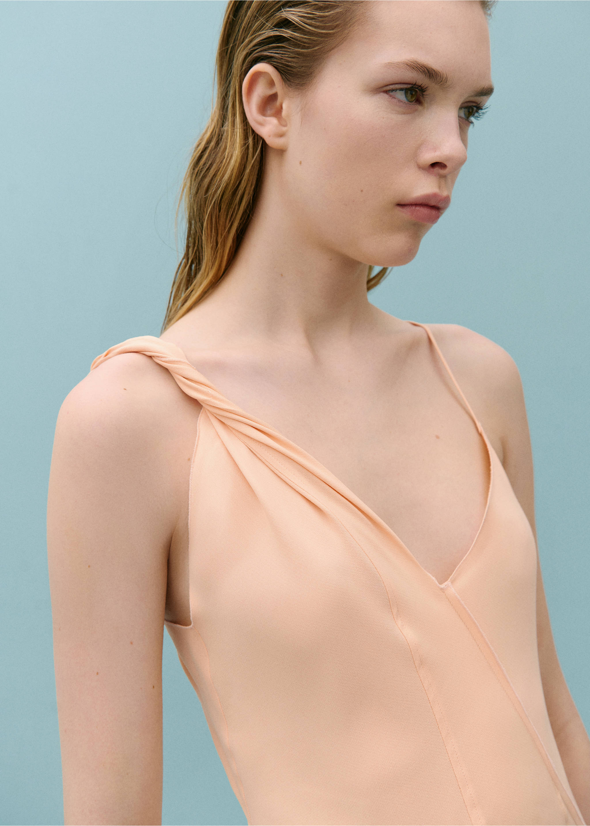 Asymmetrical dress with decorative stitching - Details of the article 1, Peach. Ref: 67008662-00.