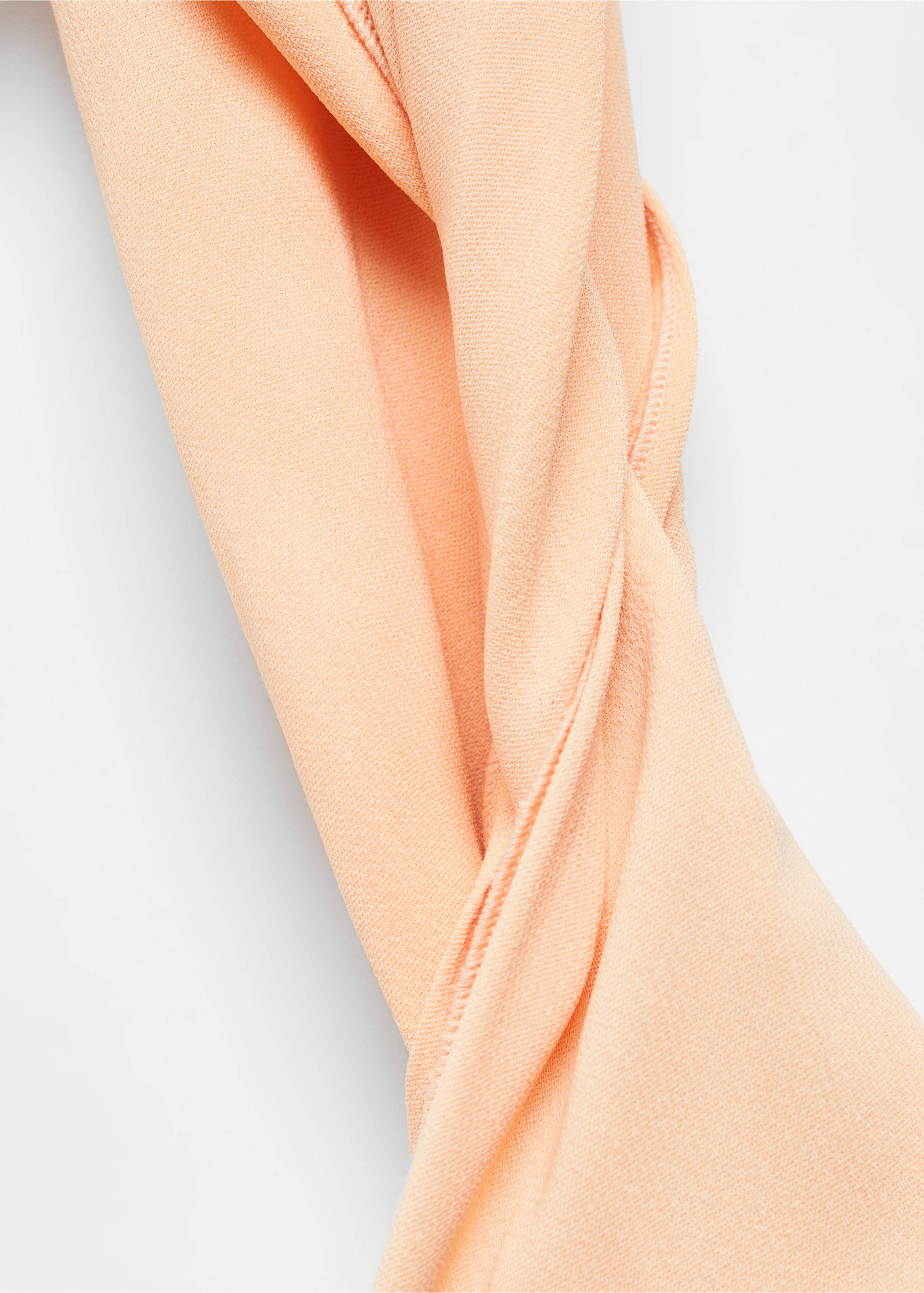 Asymmetrical dress with decorative stitching - Details of the article 8, Peach. Ref: 67008662-00.