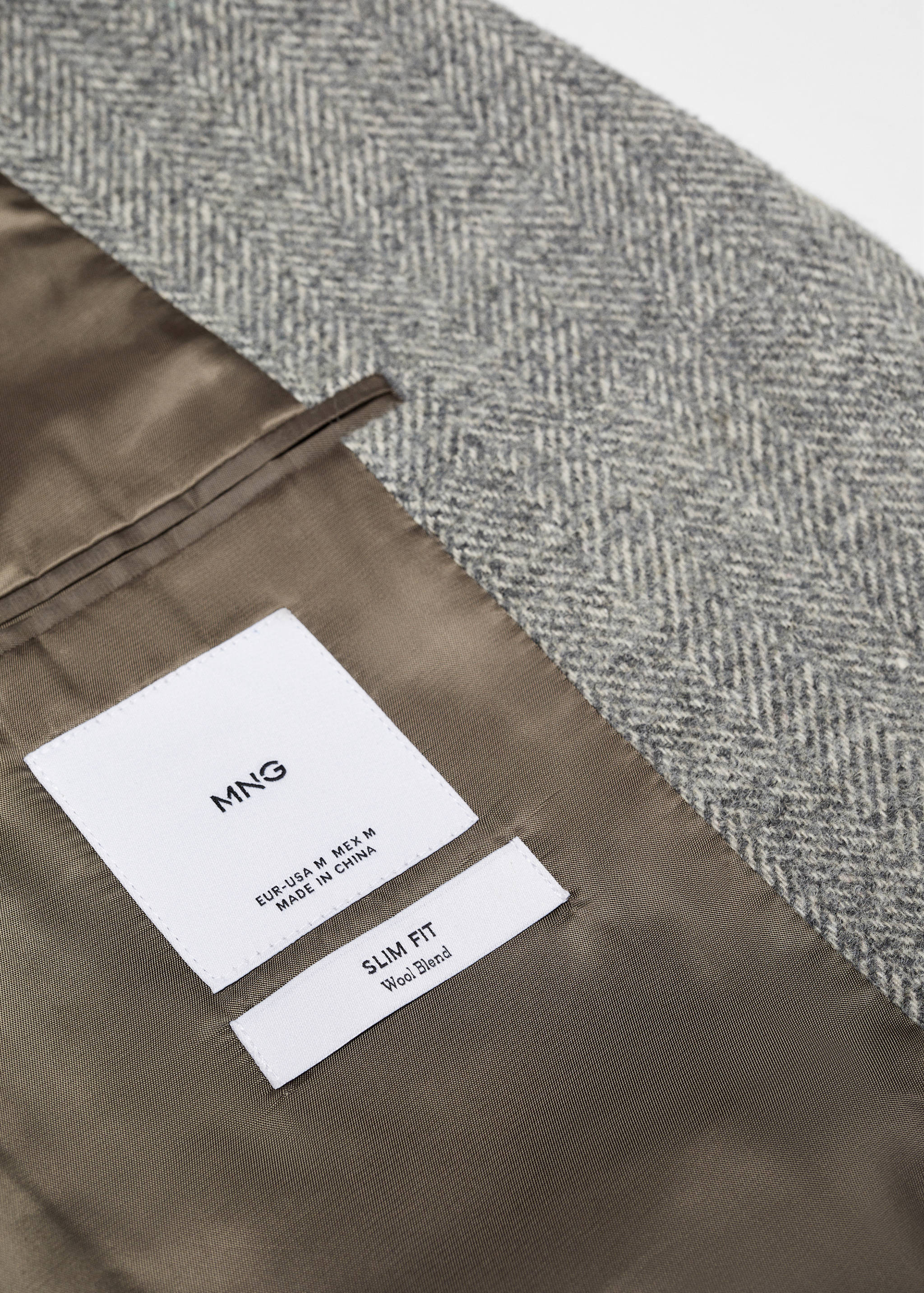 Wełniany płaszcz w jodełkę - Szczegóły artykułu 8