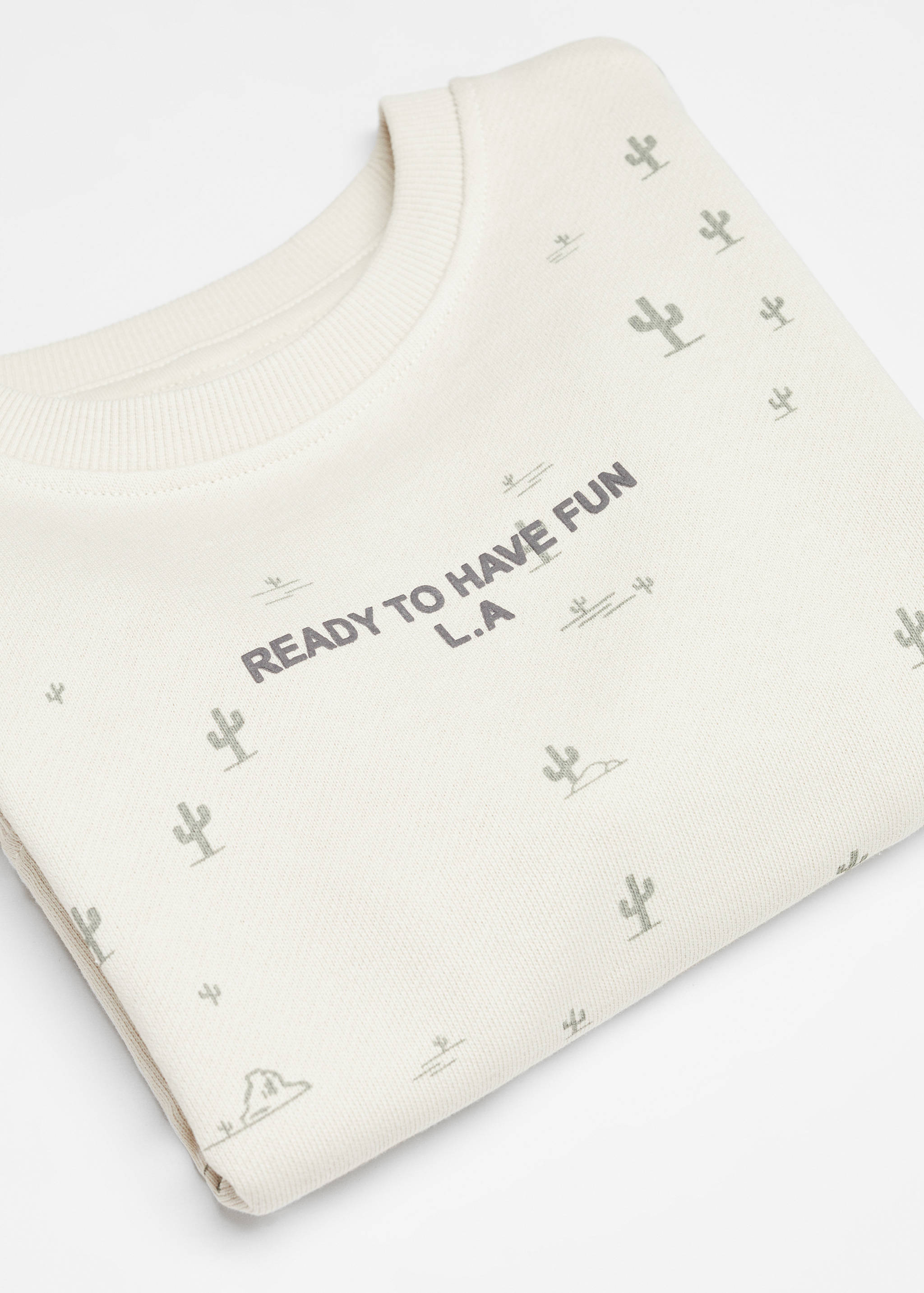 Gemustertes Sweatshirt mit Aufschrift - Detail des Artikels 8