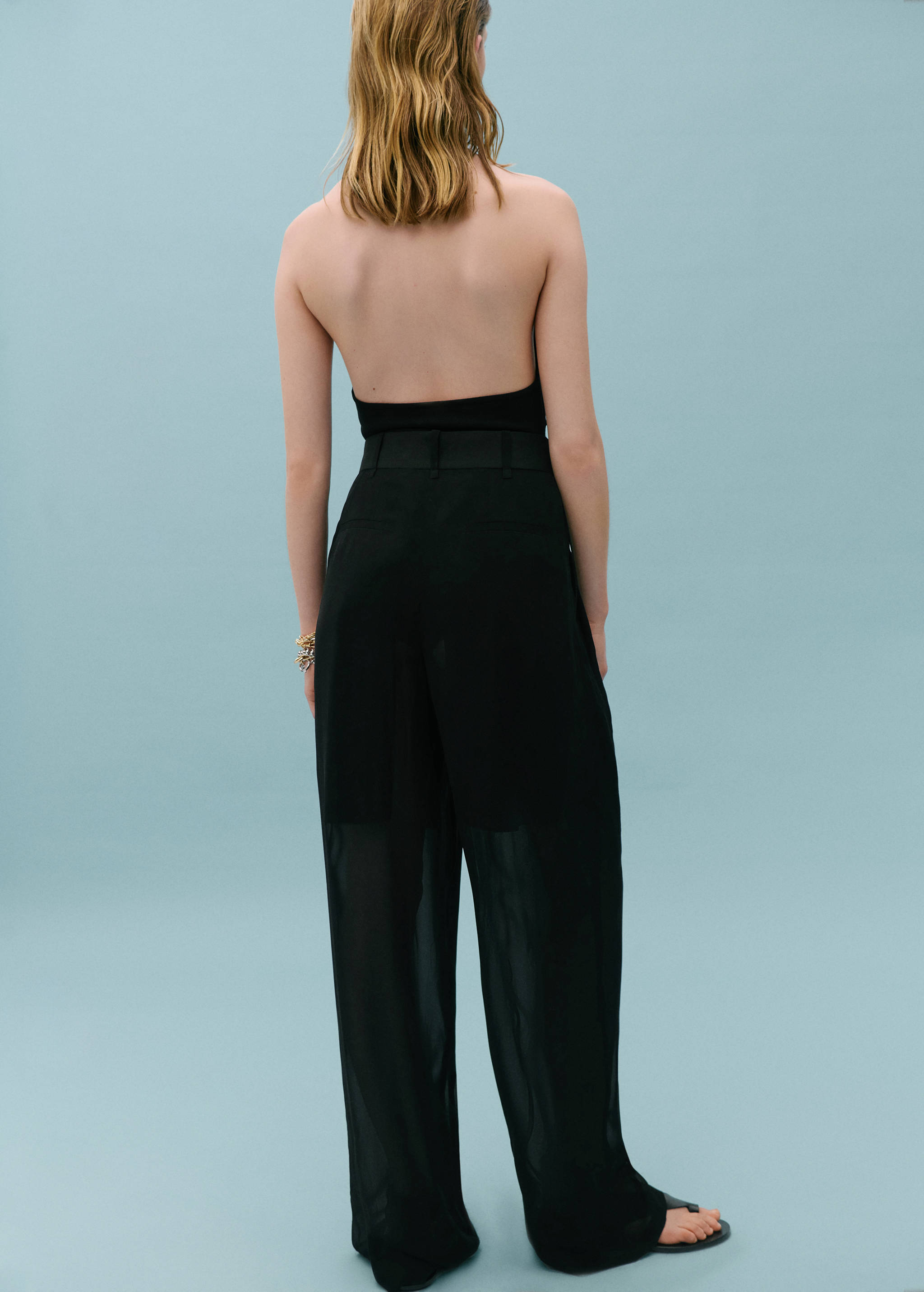 Rett halvgjennomsiktig bukse - Baksiden av artikkelen