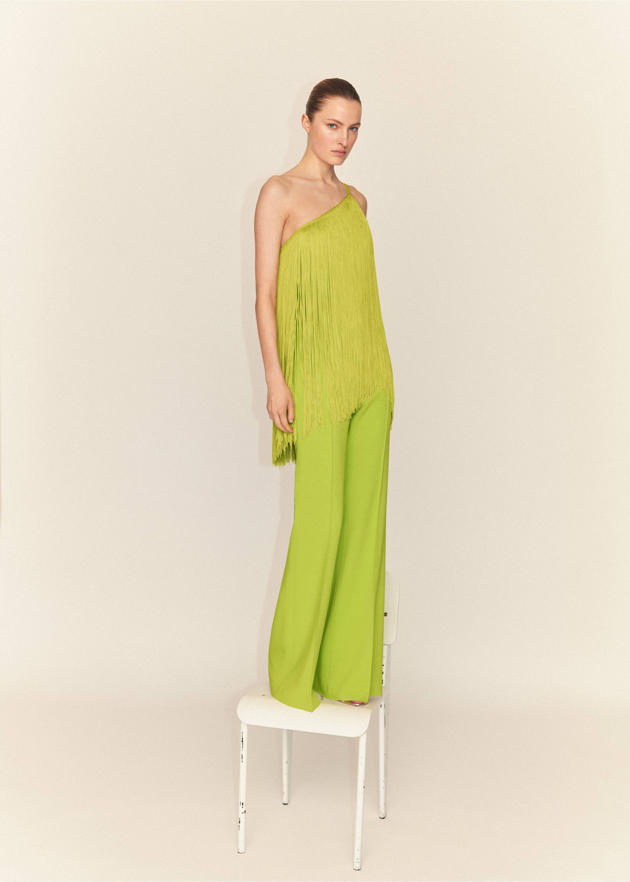 High-waist flared broek - Detail van het artikel 1, Limoen. Ref: 67019237-00.