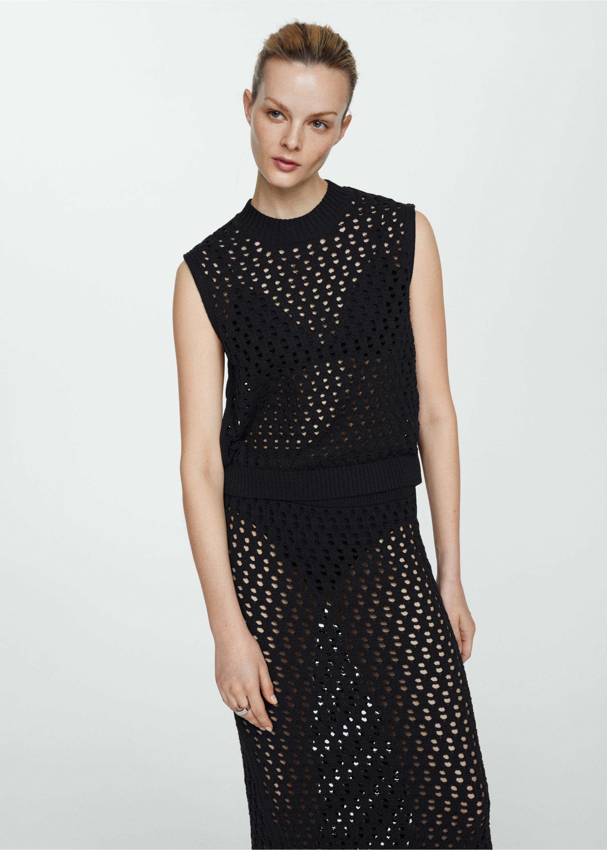 Openwork knitted skirt - Details of the article 1, Black. Ref: 67027141-00.