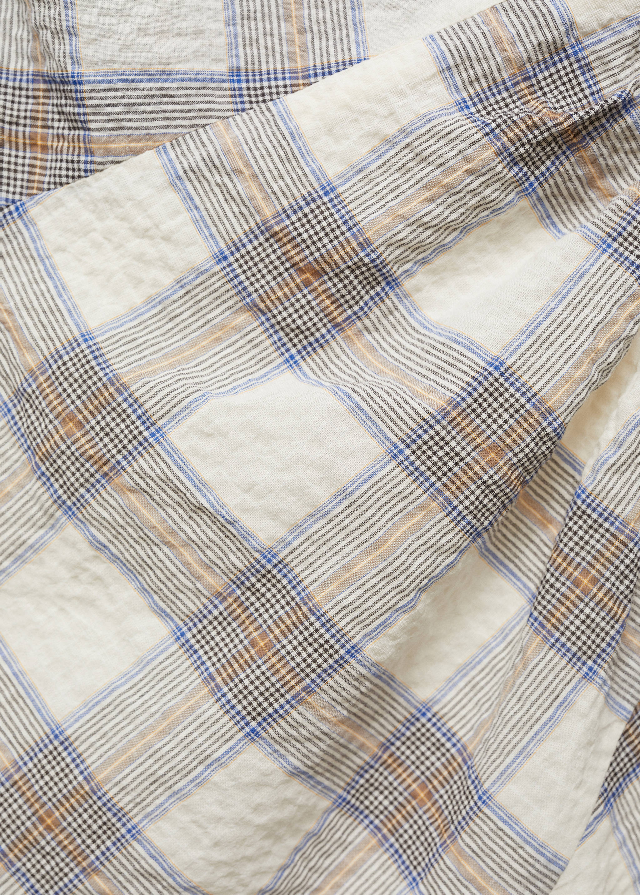 Vestido assimétrico aos quadrados - Pormenor do artigo 8