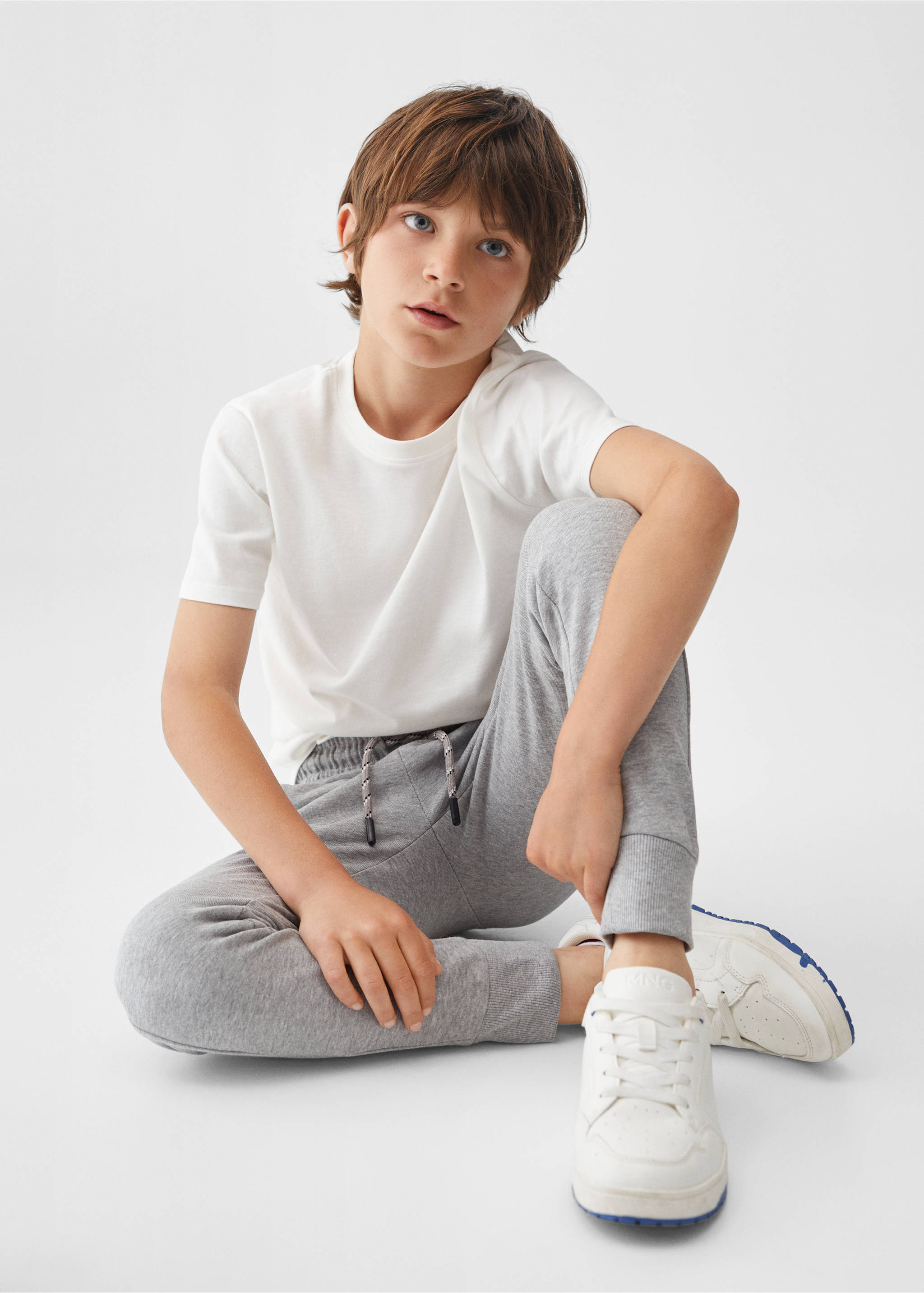 Cotton jogger-style trousers - Details of the article 6, Medium Heather Grey. Ref: 67030659-00.