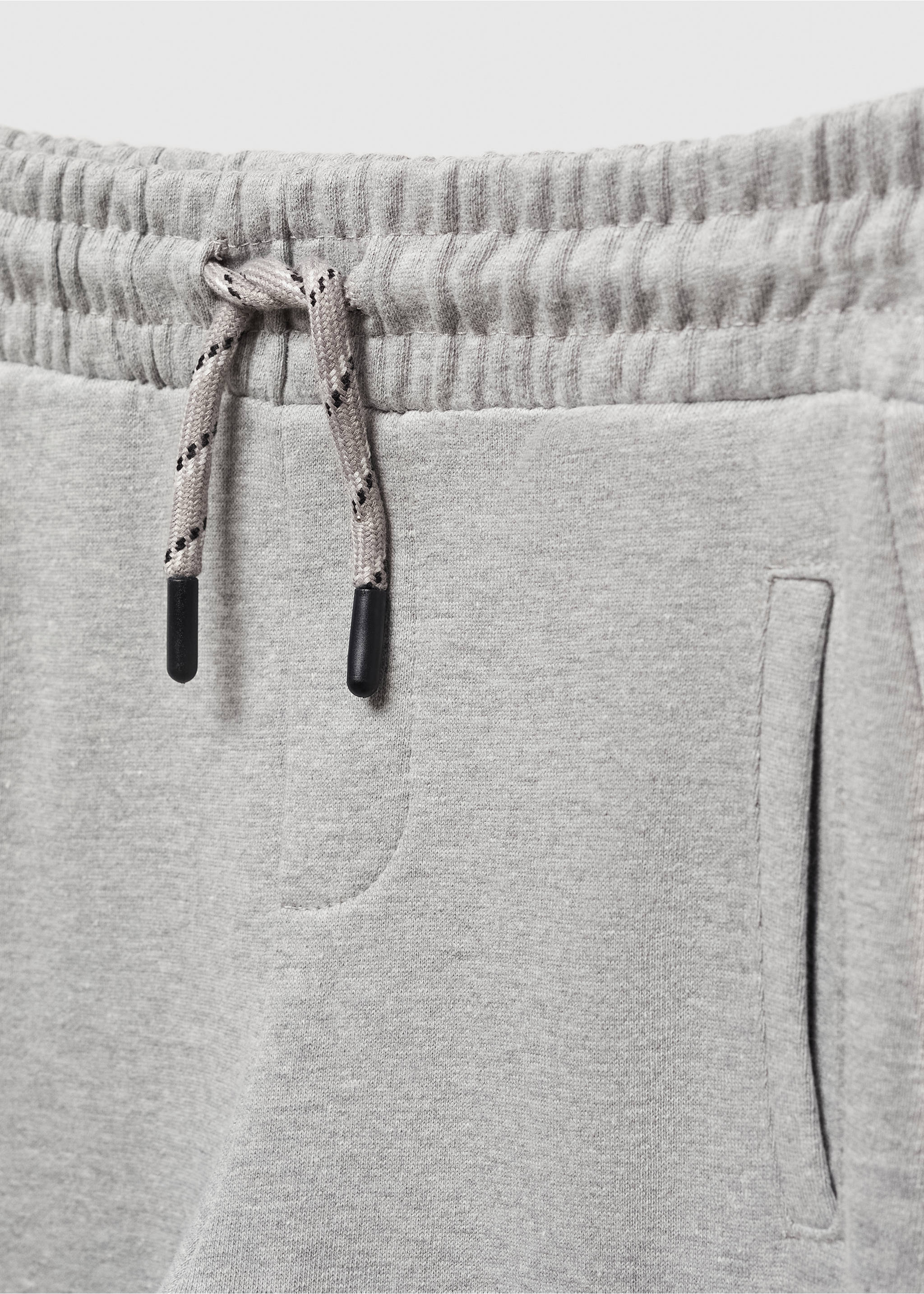 Cotton jogger-style trousers - Details of the article 8, Medium Heather Grey. Ref: 67030659-00.