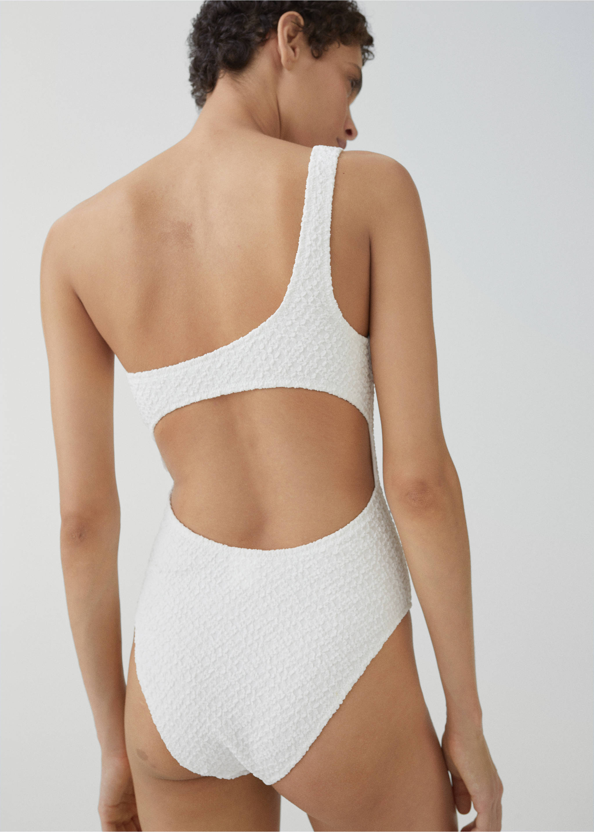 Asymmetrical textured swimsuit - Reverse of the article, White. Ref: 67034016-00.