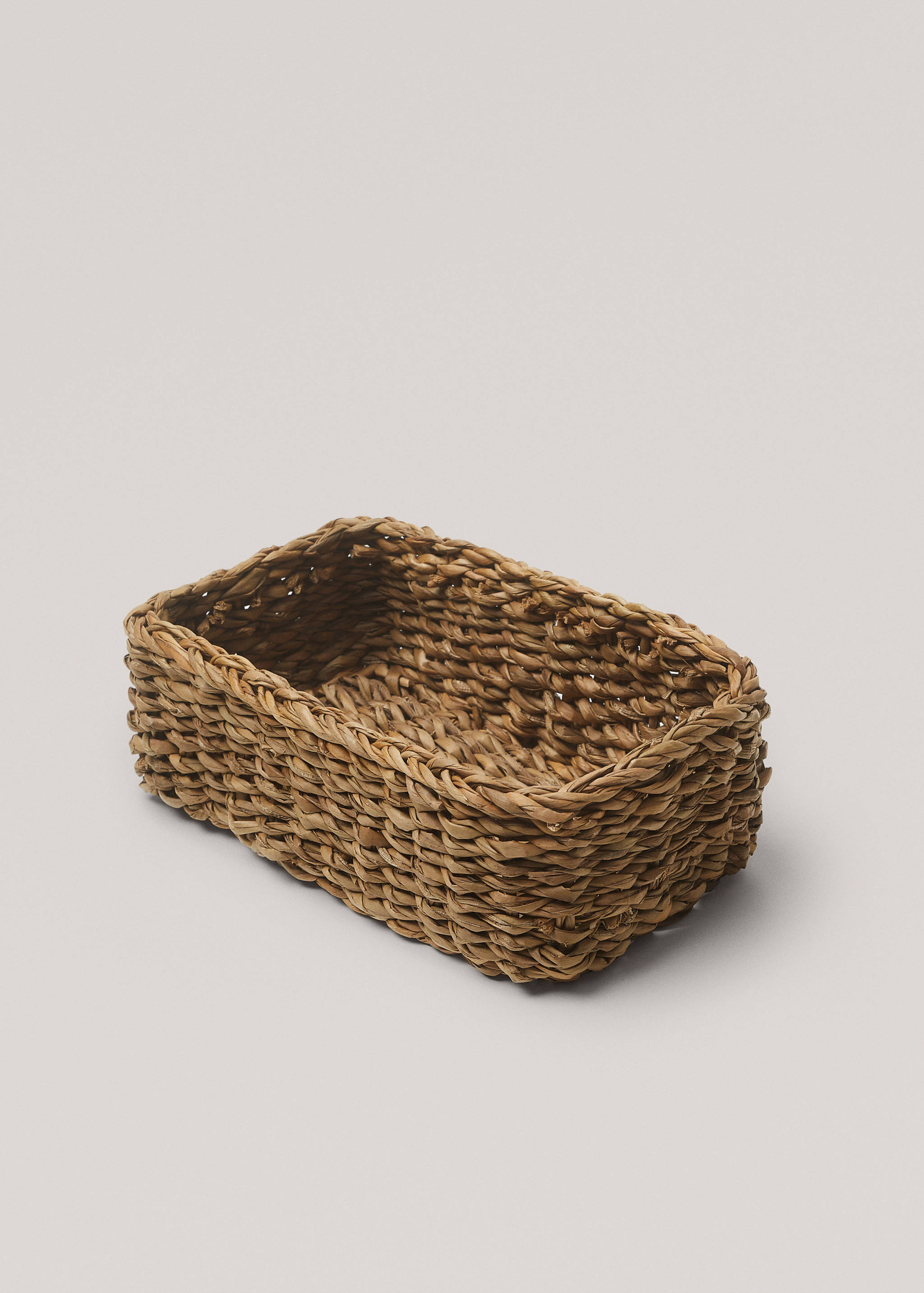 Flätad korg naturfibrer 22x14 cm - Bild av mittparti