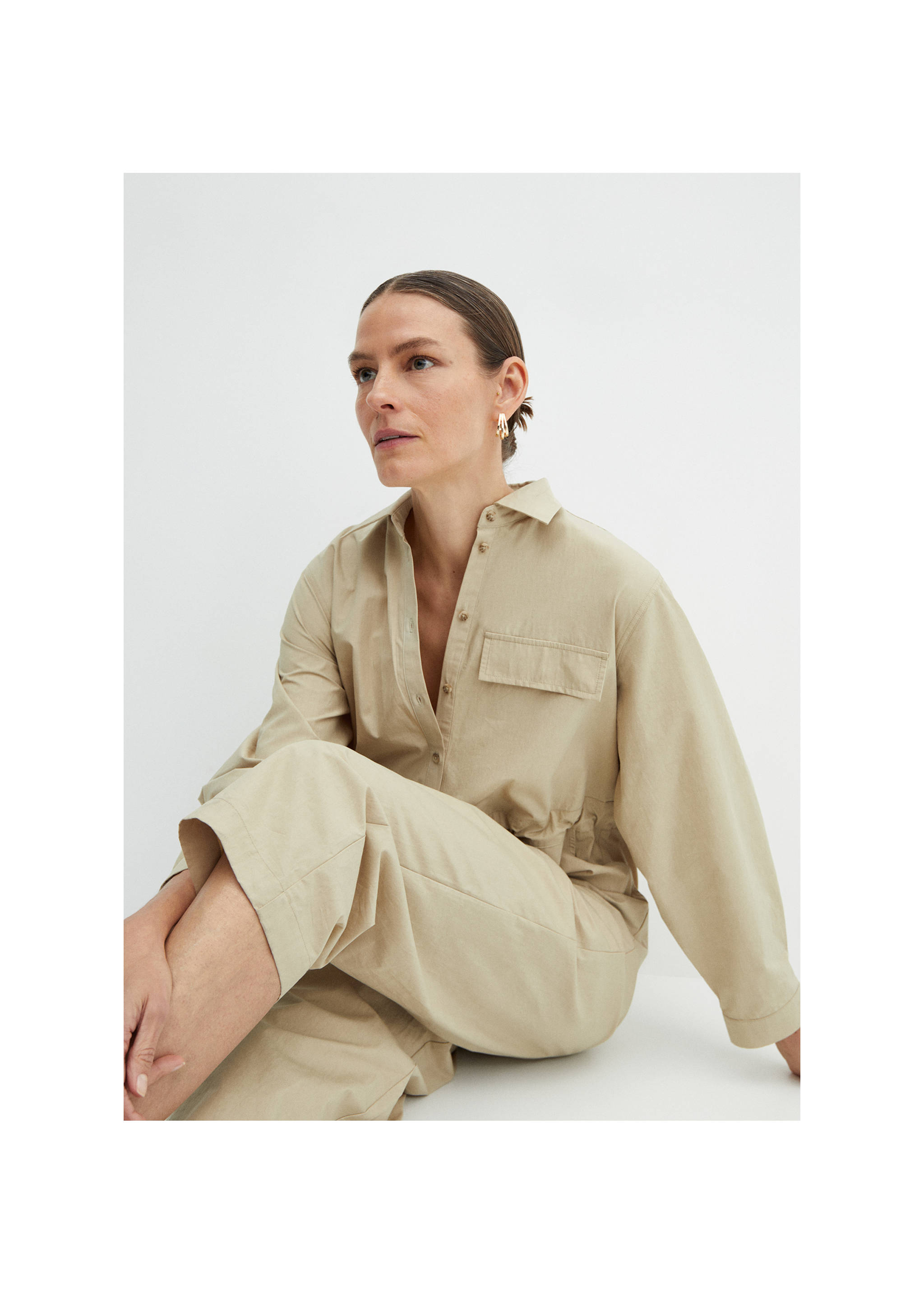 Buttoned long jumpsuit - Details of the article 1, Medium Brown. Ref: 67035742-00.