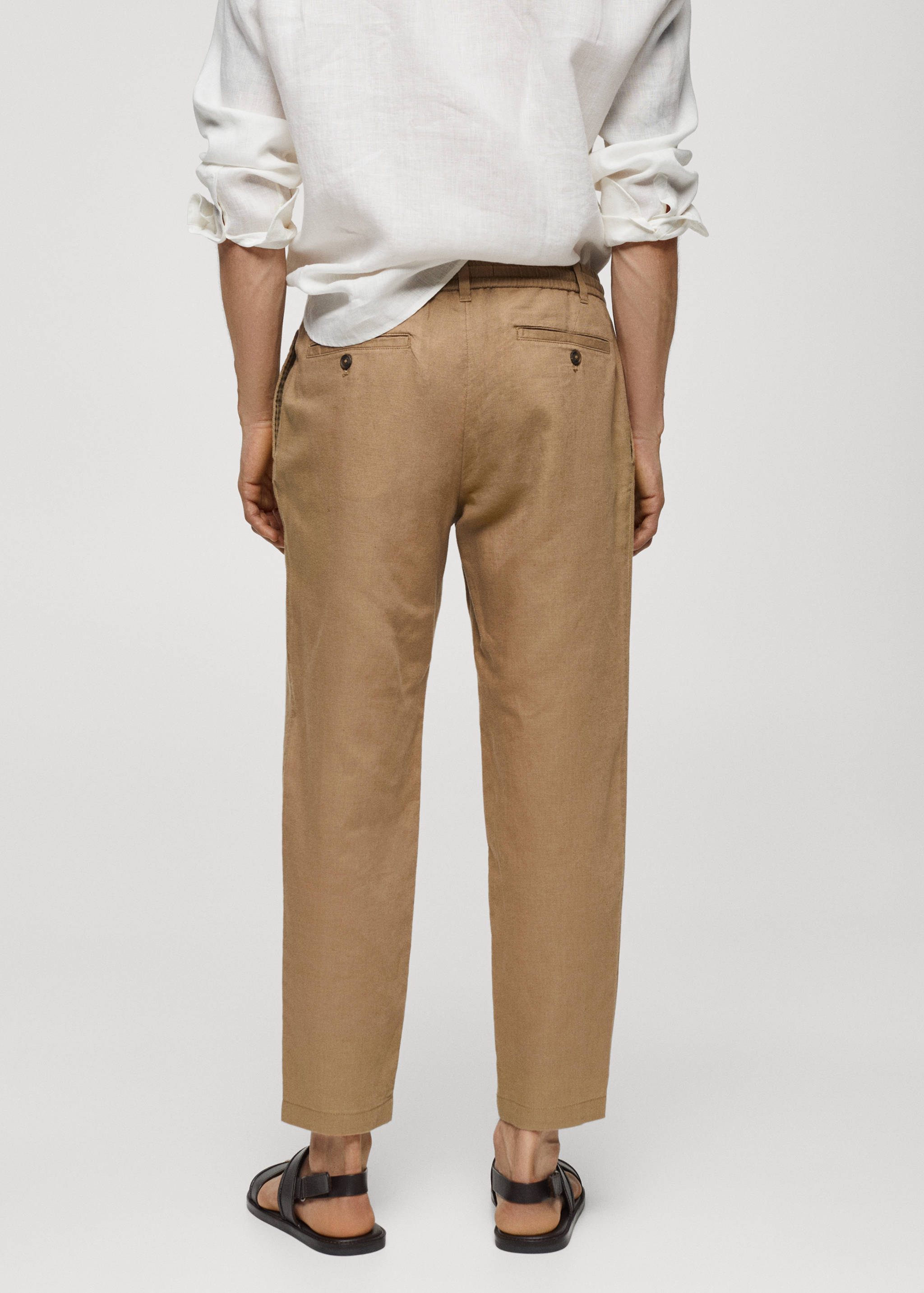 Slim-fit trousers with drawstring - Reverse of the article