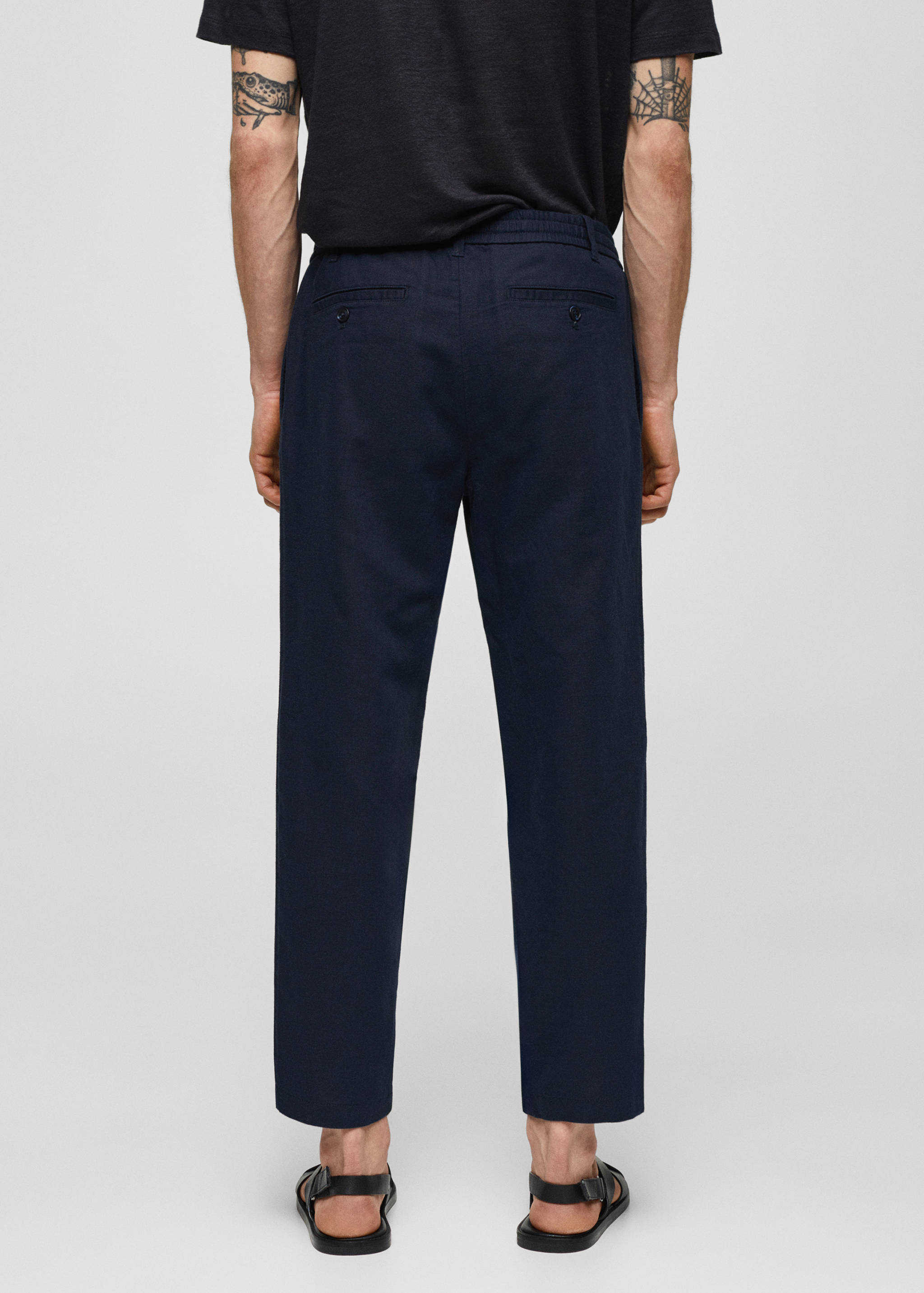 Slim-fit trousers with drawstring - Reverse of the article