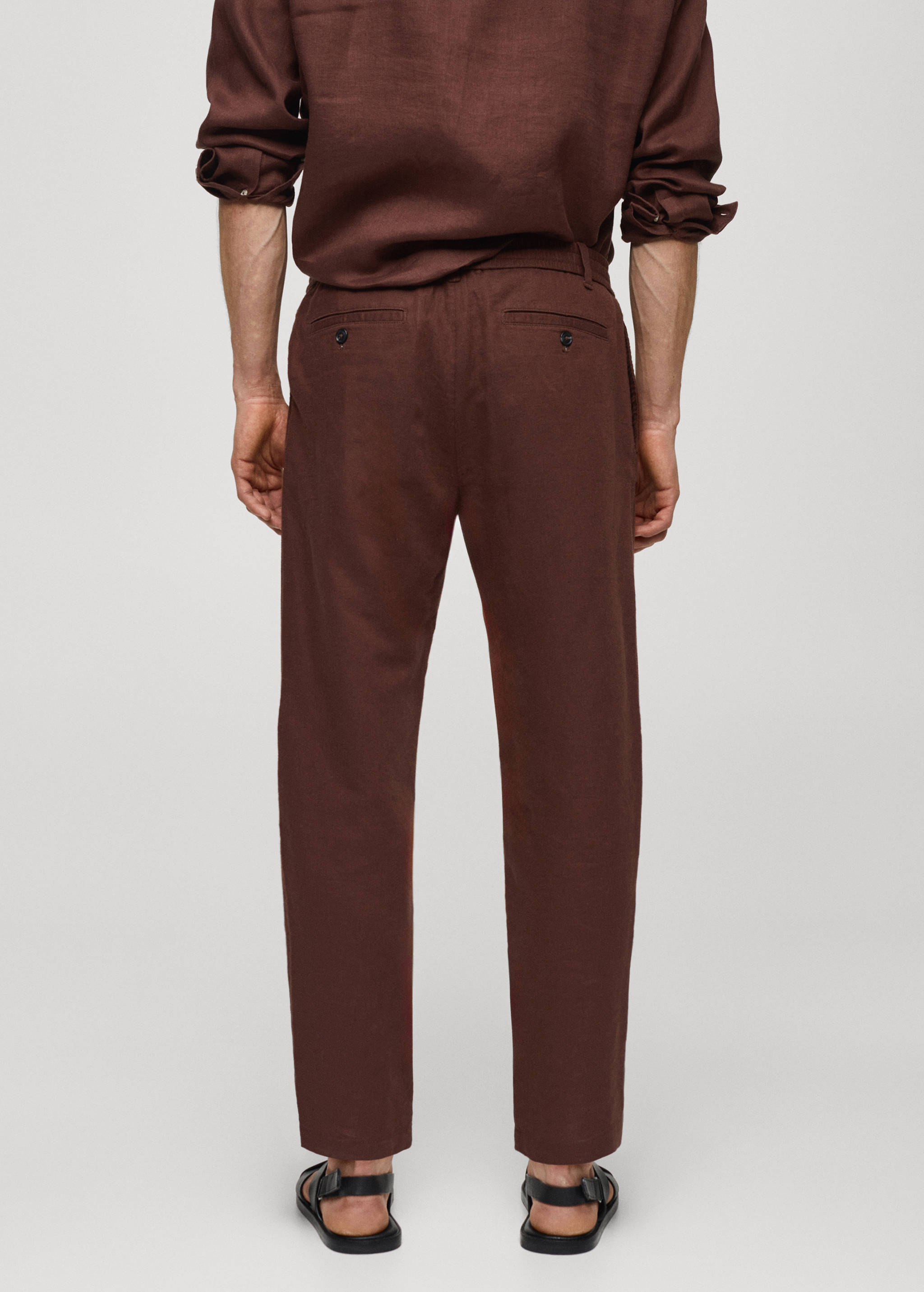 Slim-fit trousers with drawstring - Reverse of the article
