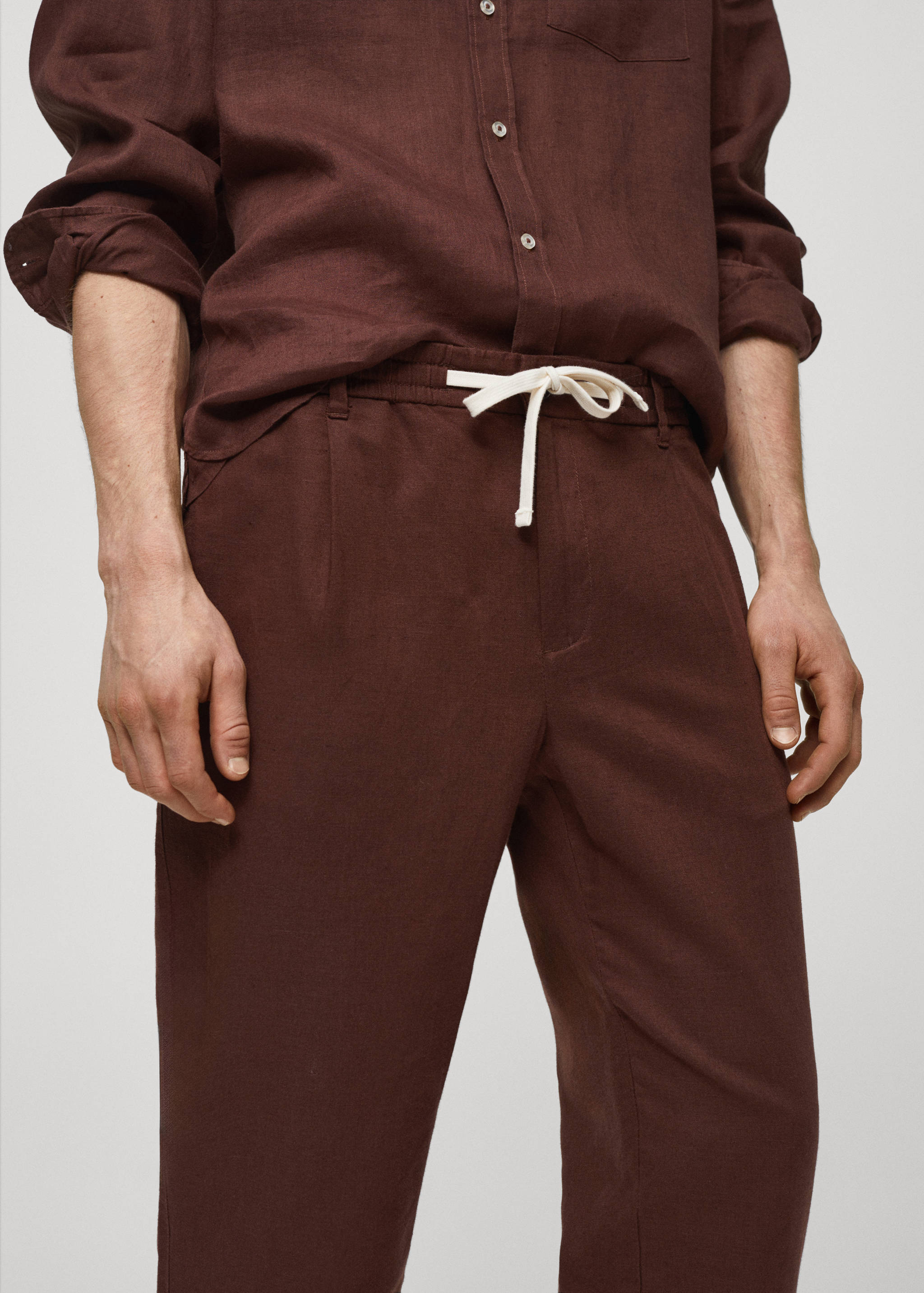 Slim-fit trousers with drawstring - Details of the article 1