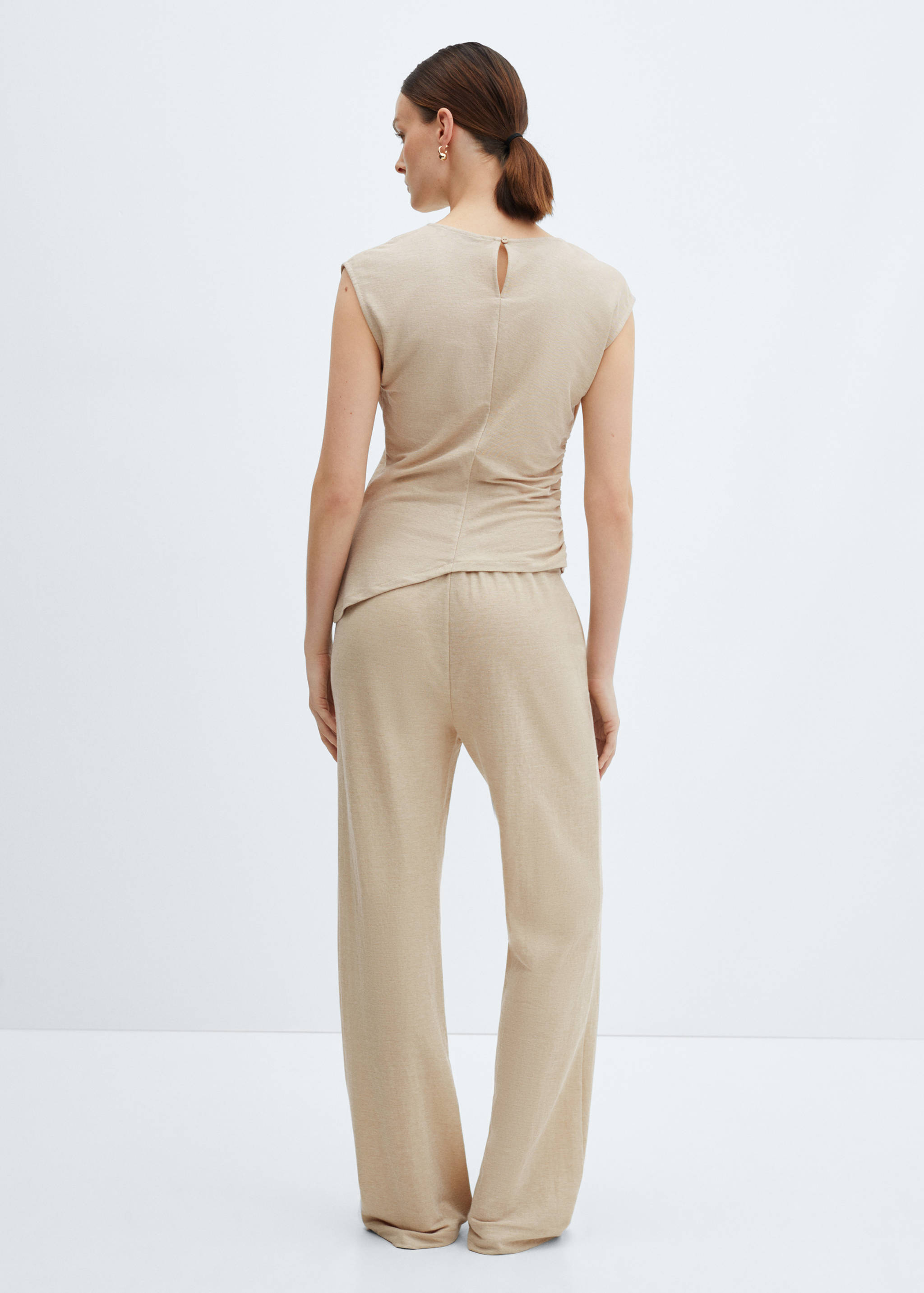 Wide leg trousers with elastic waist - Reverse of the article