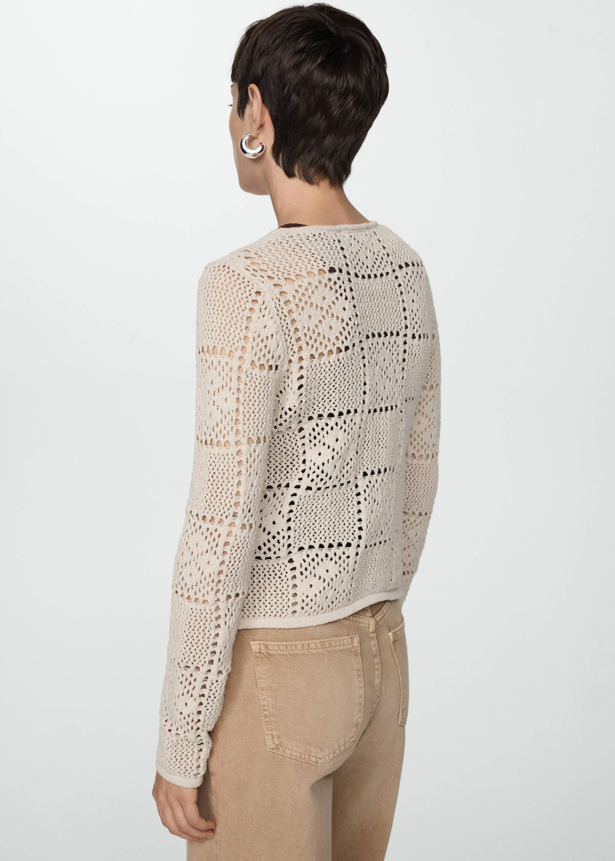 Crochet sweater with openwork details - Reverse of the article