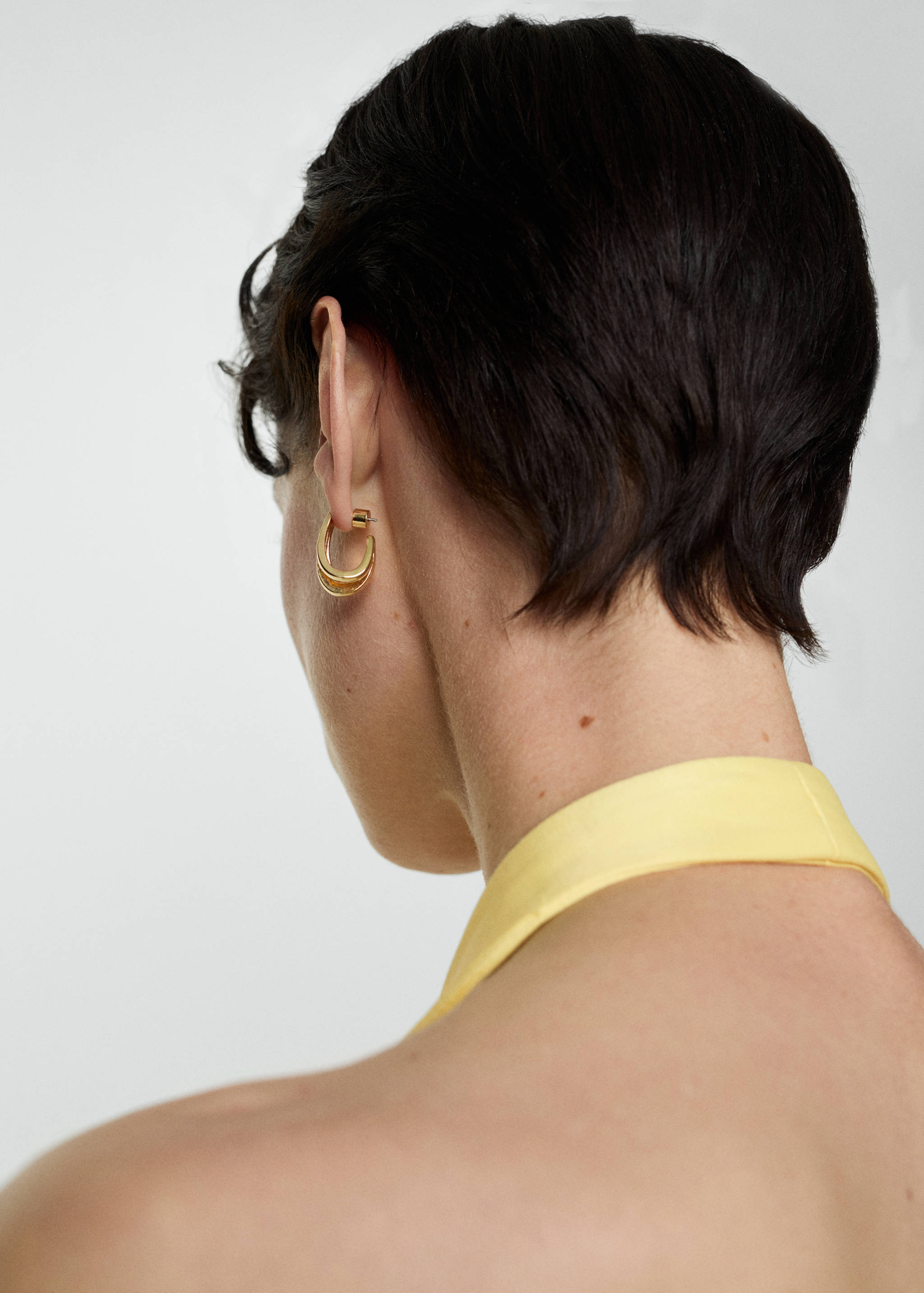 Halter-neck vest with buttons - Details of the article 1