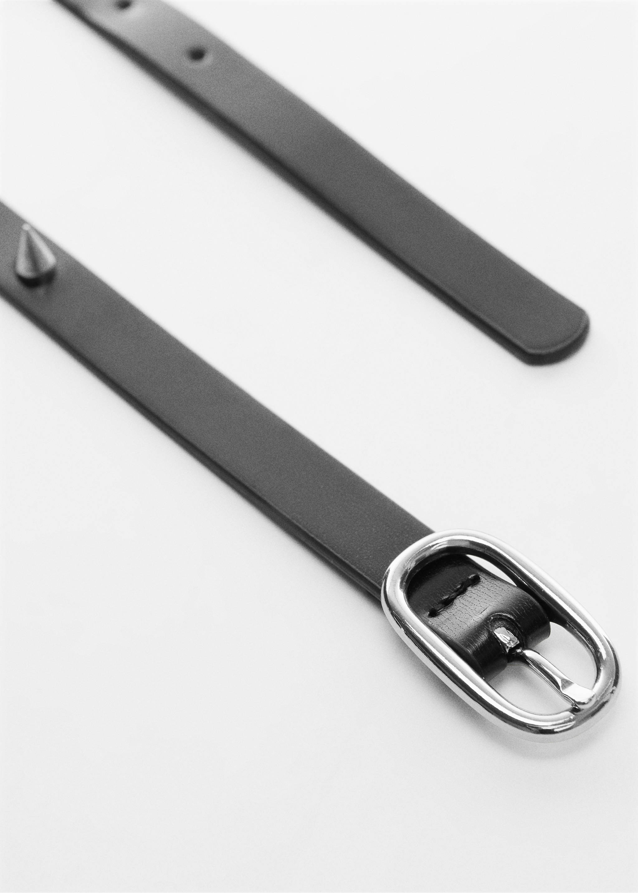 Gürtel mit Stachelverzierung - Detail des Artikels 1