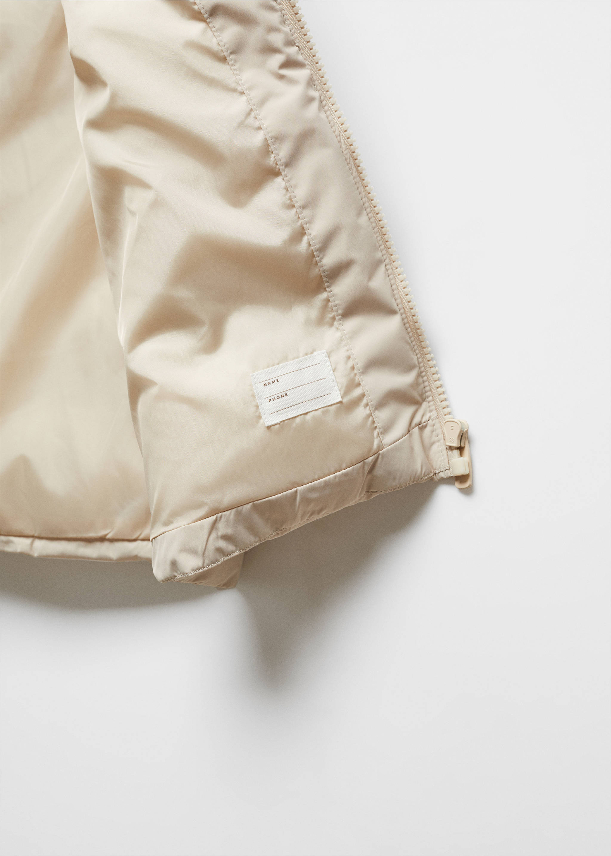Steppweste mit Kapuze - Detail des Artikels 8, Beige. Ref: 67041506-00.