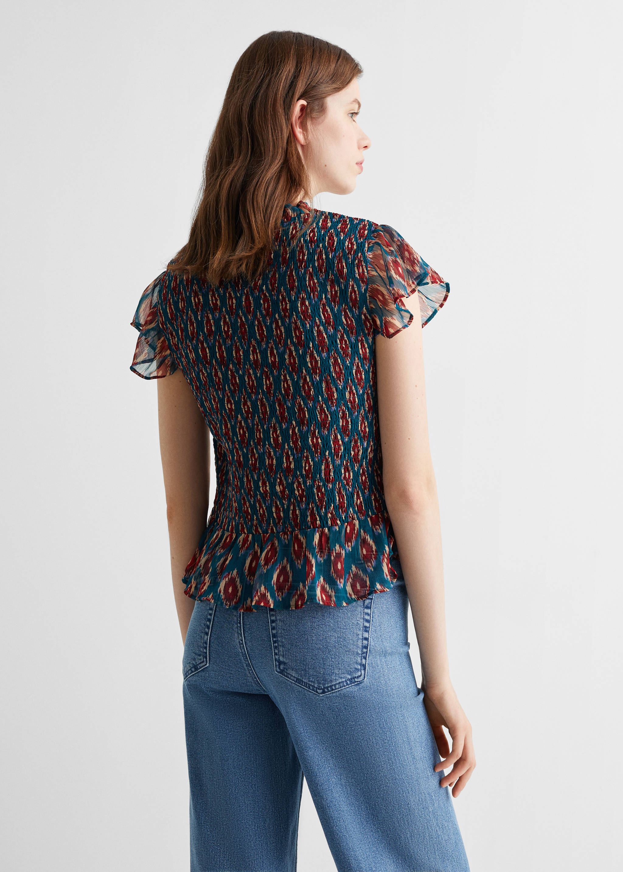 Blusa enrugada de manga com folho - Verso do artigo