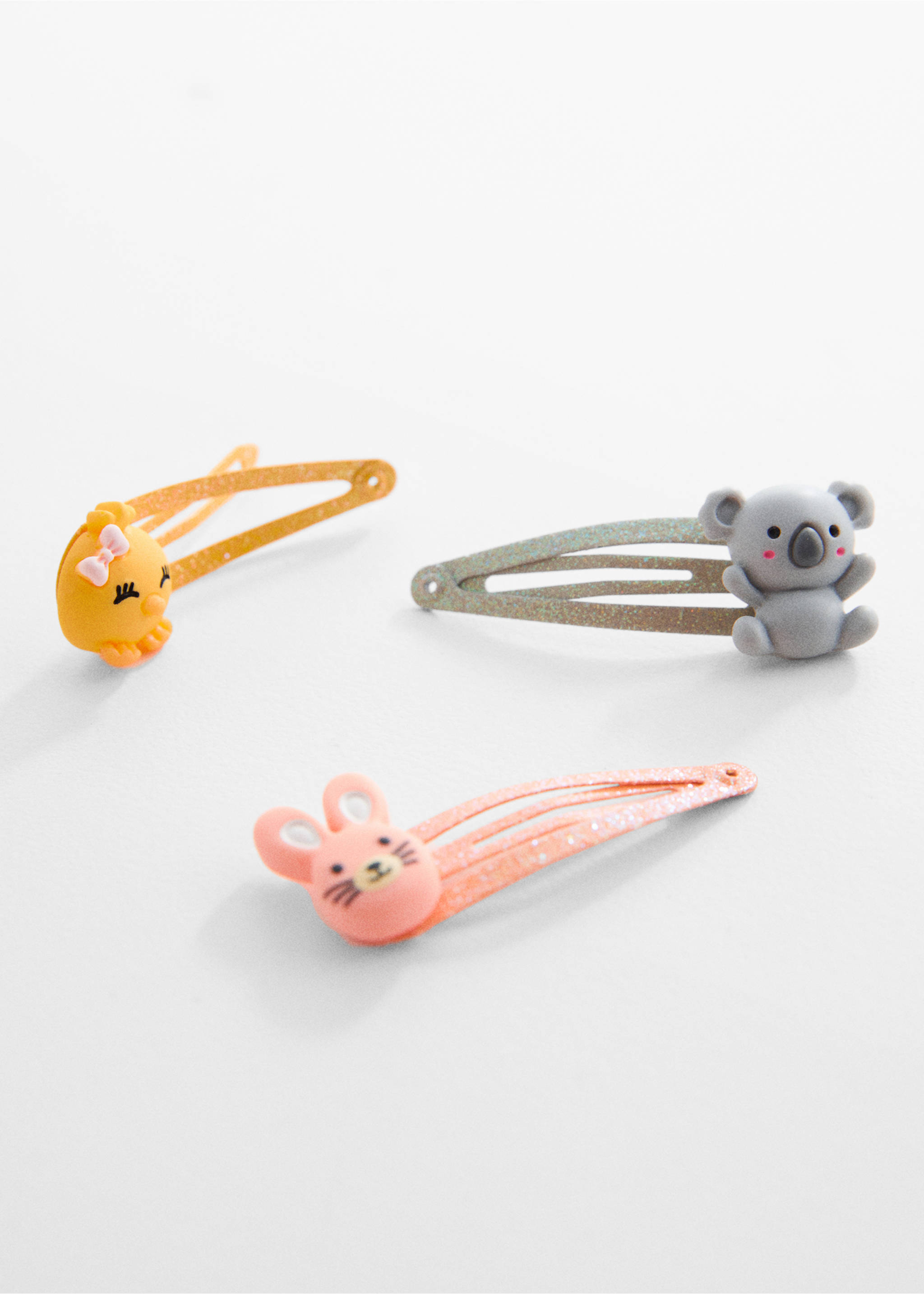 Pack Haargummis und -clips - Detail des Artikels 1, Grau. Ref: 67044772-00.