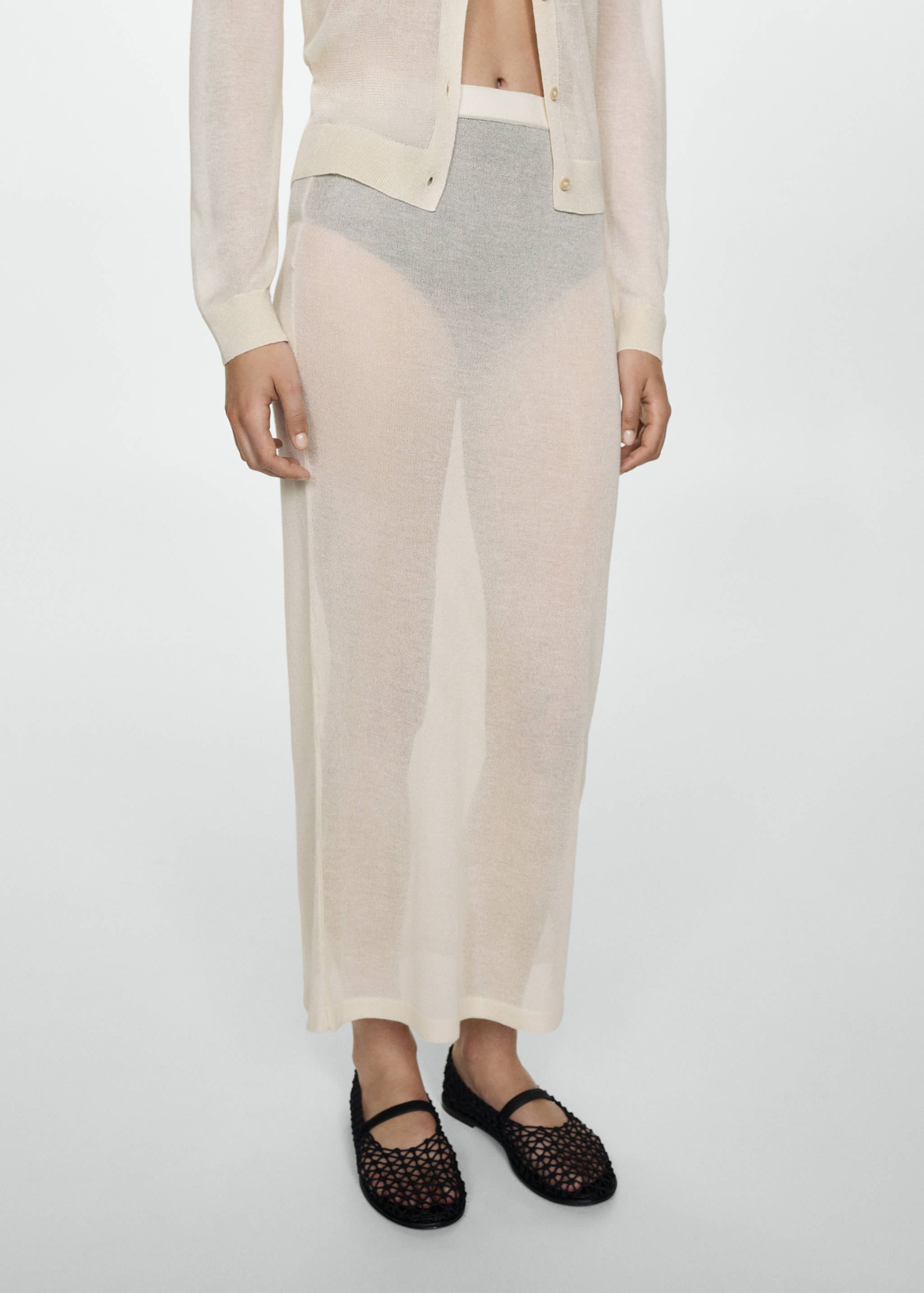 Falda punto semitrasparente - Plano medio