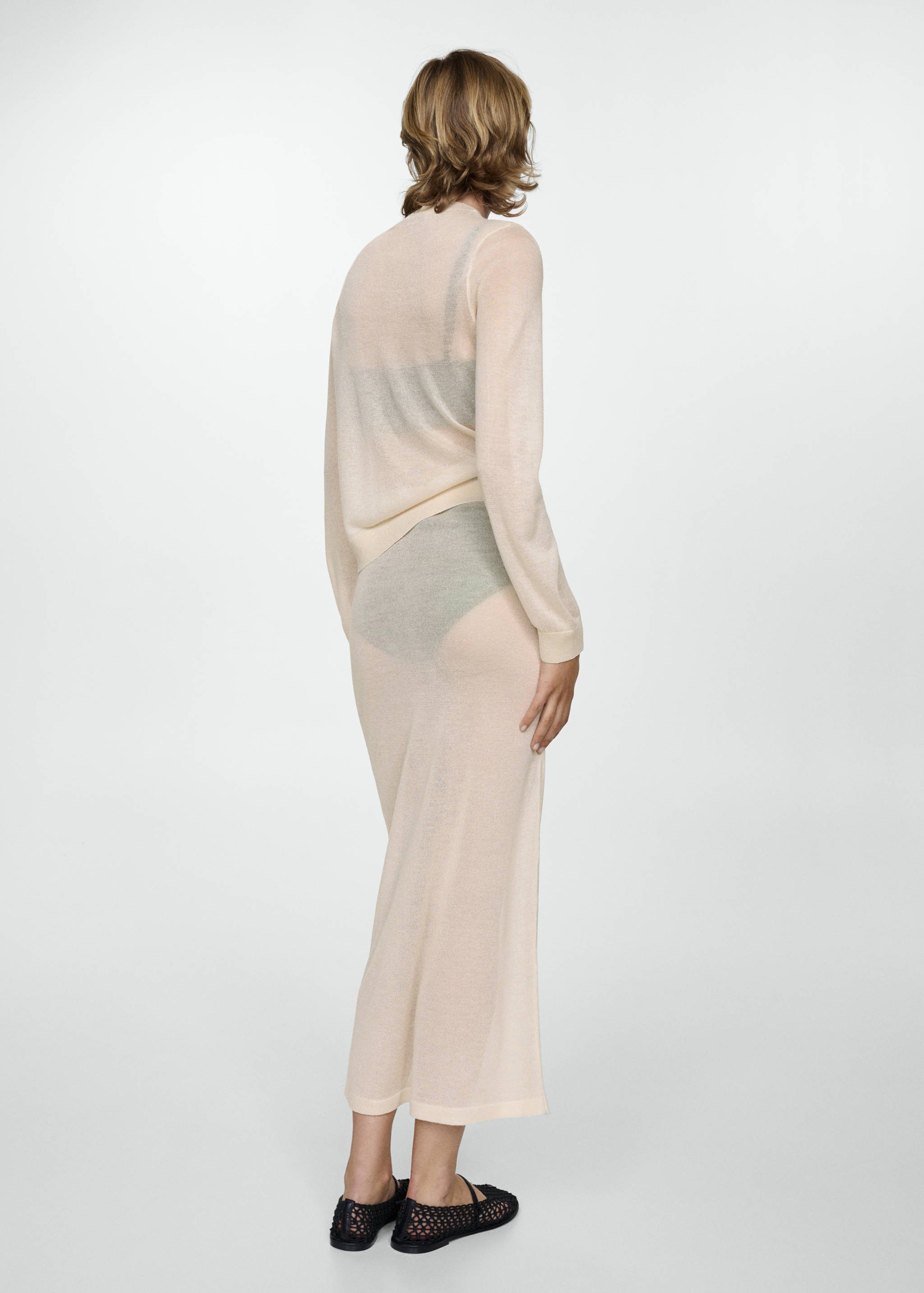 Falda punto semitrasparente - Reverso del artículo