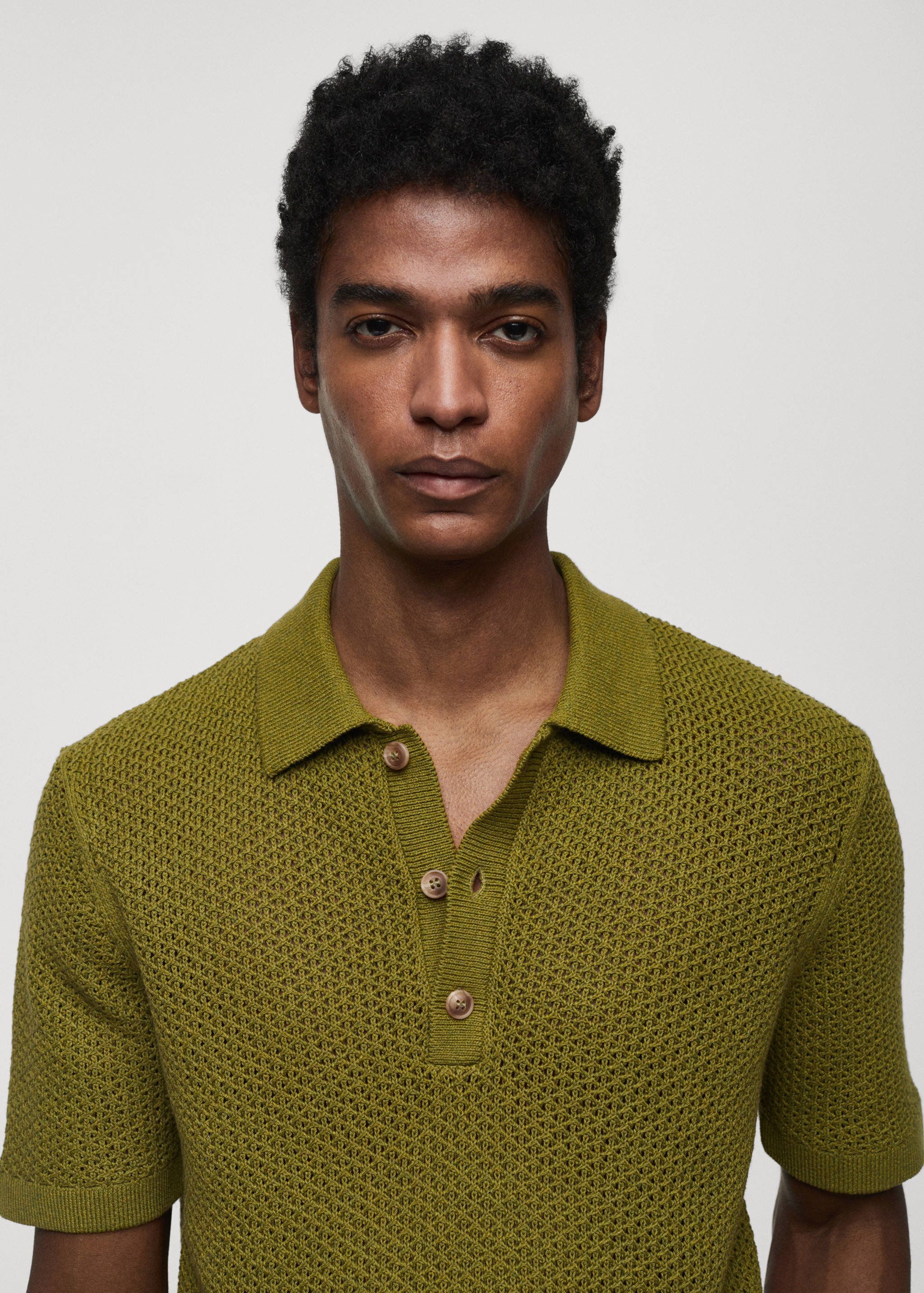 Strickpoloshirt in Flecht-Optik - Detail des Artikels 1