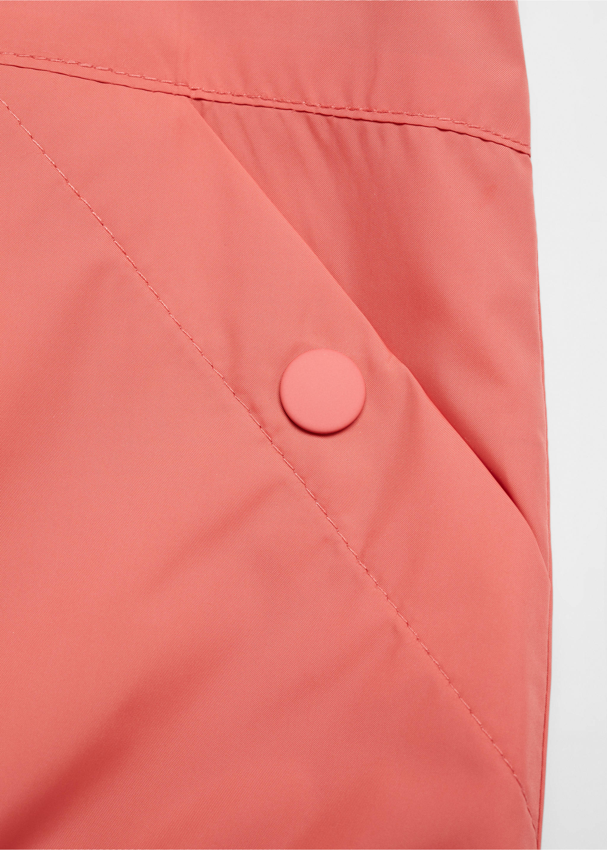 Raincoat hooded jacket - Details of the article 0, Coral Red. Ref: 67047916-00.