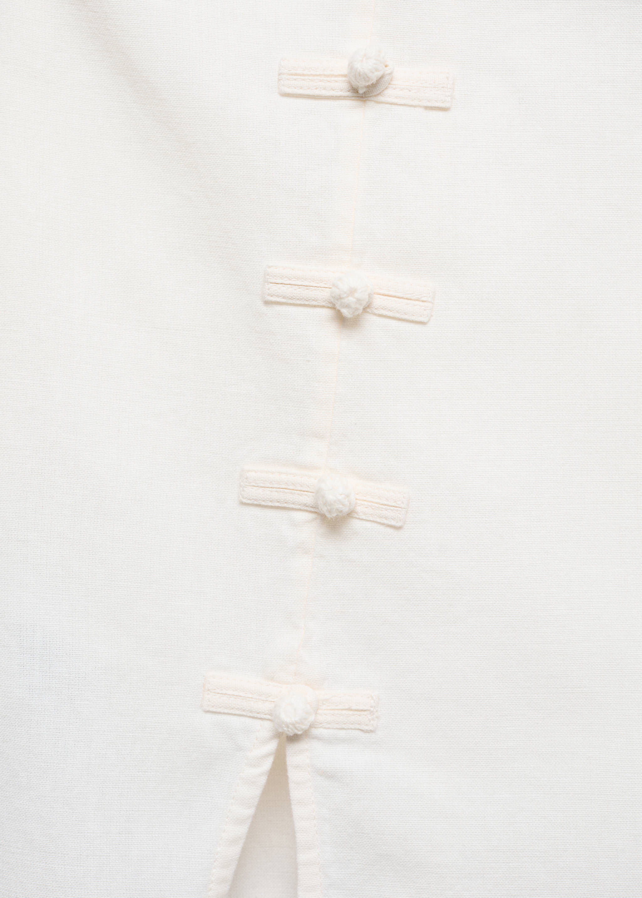Mini-skirt with decorative buttons - Details of the article 8