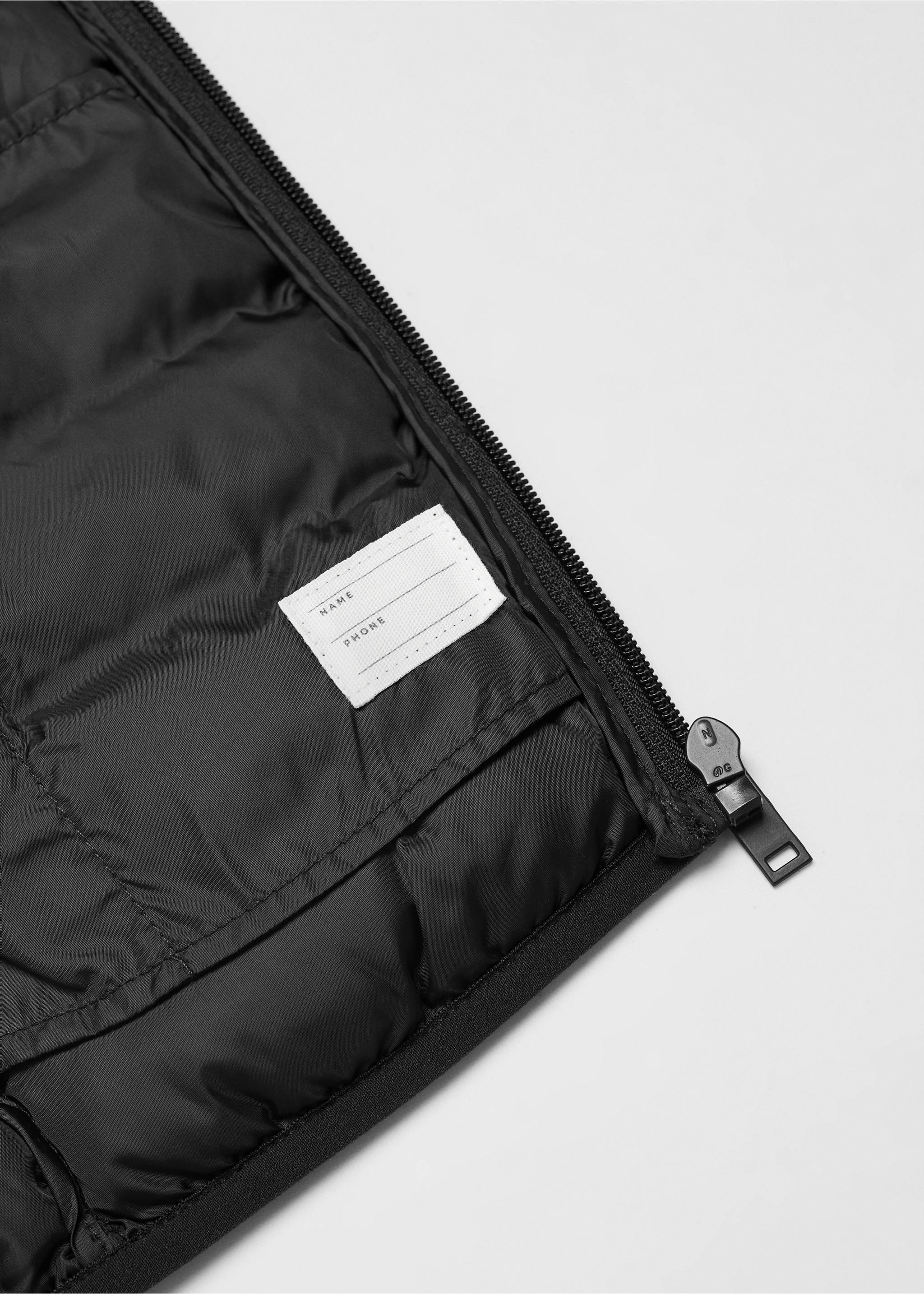 Quilted gilet with hood - Details of the article 8, Black. Ref: 67051505-00.