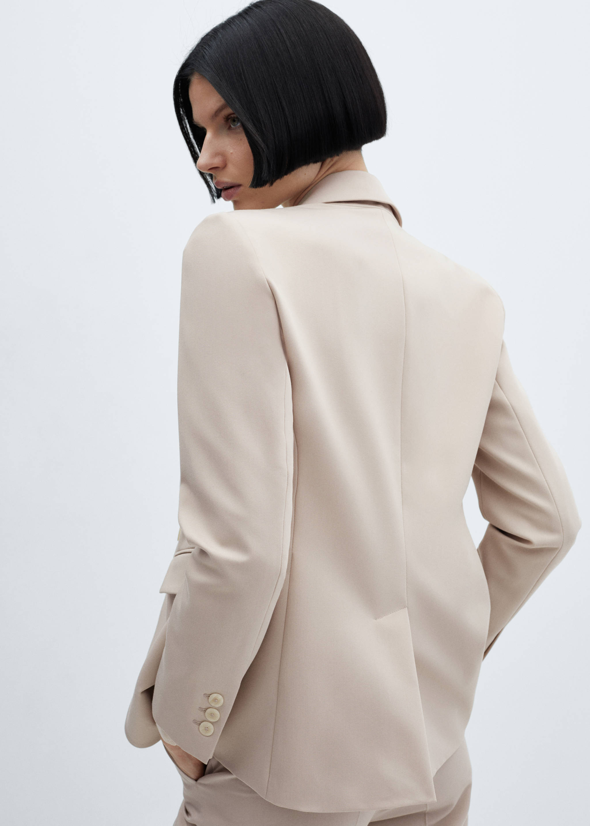 Americana traje entallada - Reverso del artículo