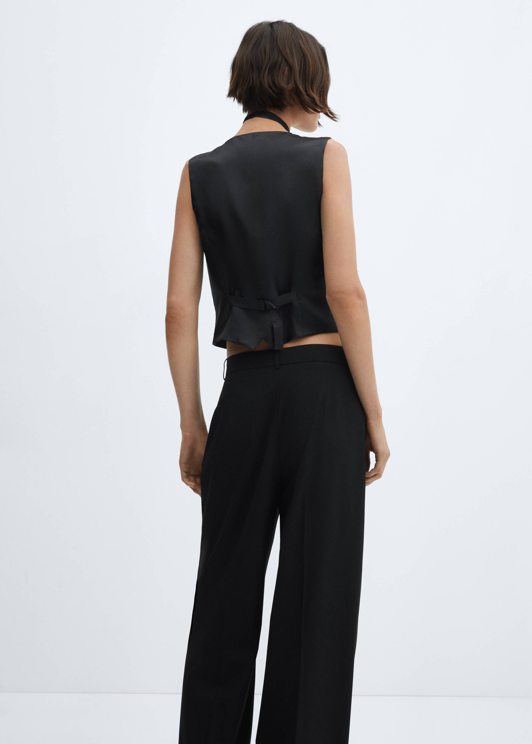 Kamizelka garniturowa na guziki - Tylna strona artykułu