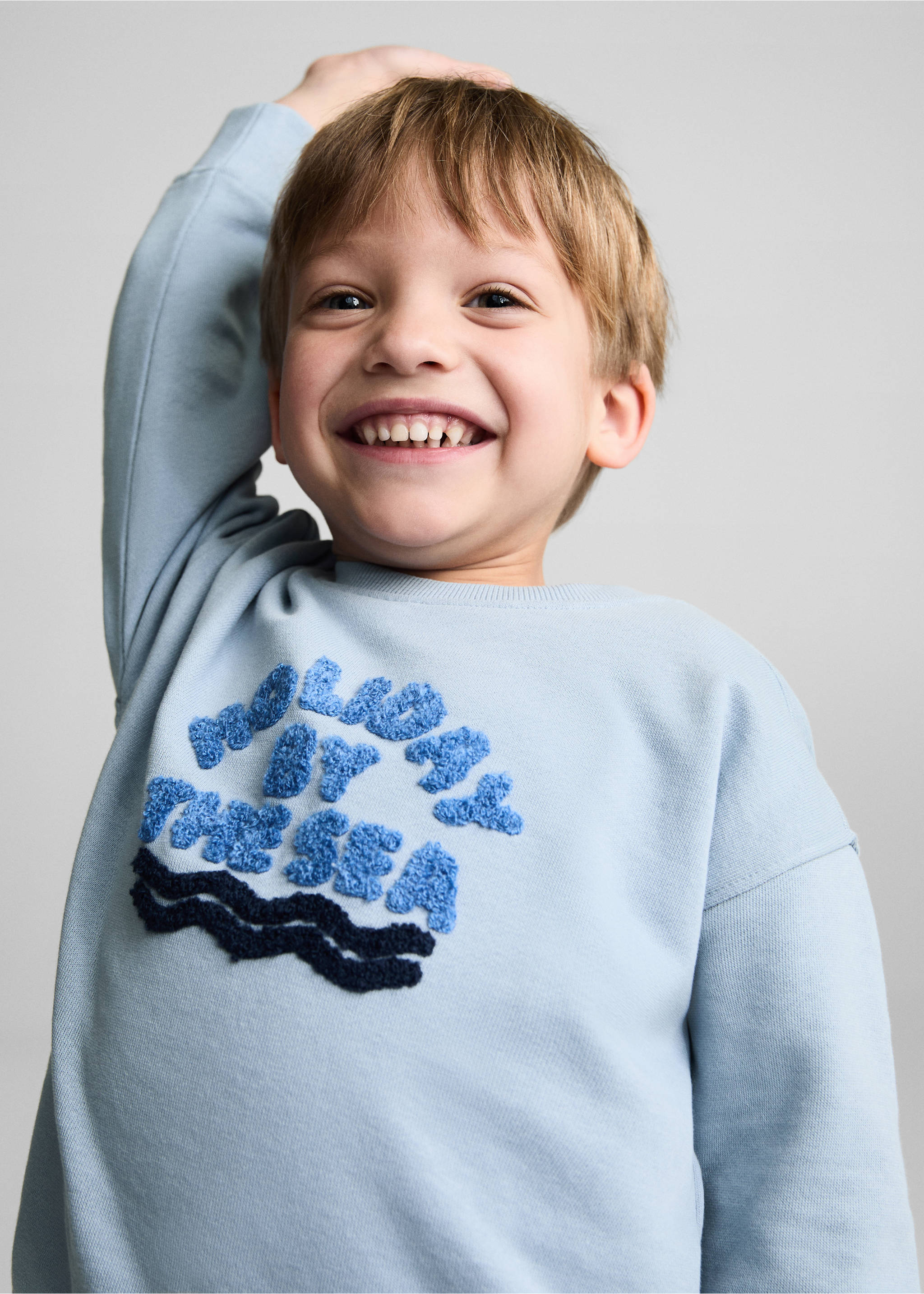 Textured message sweatshirt - Details of the article 1, Sky Blue. Ref: 67056005-00.