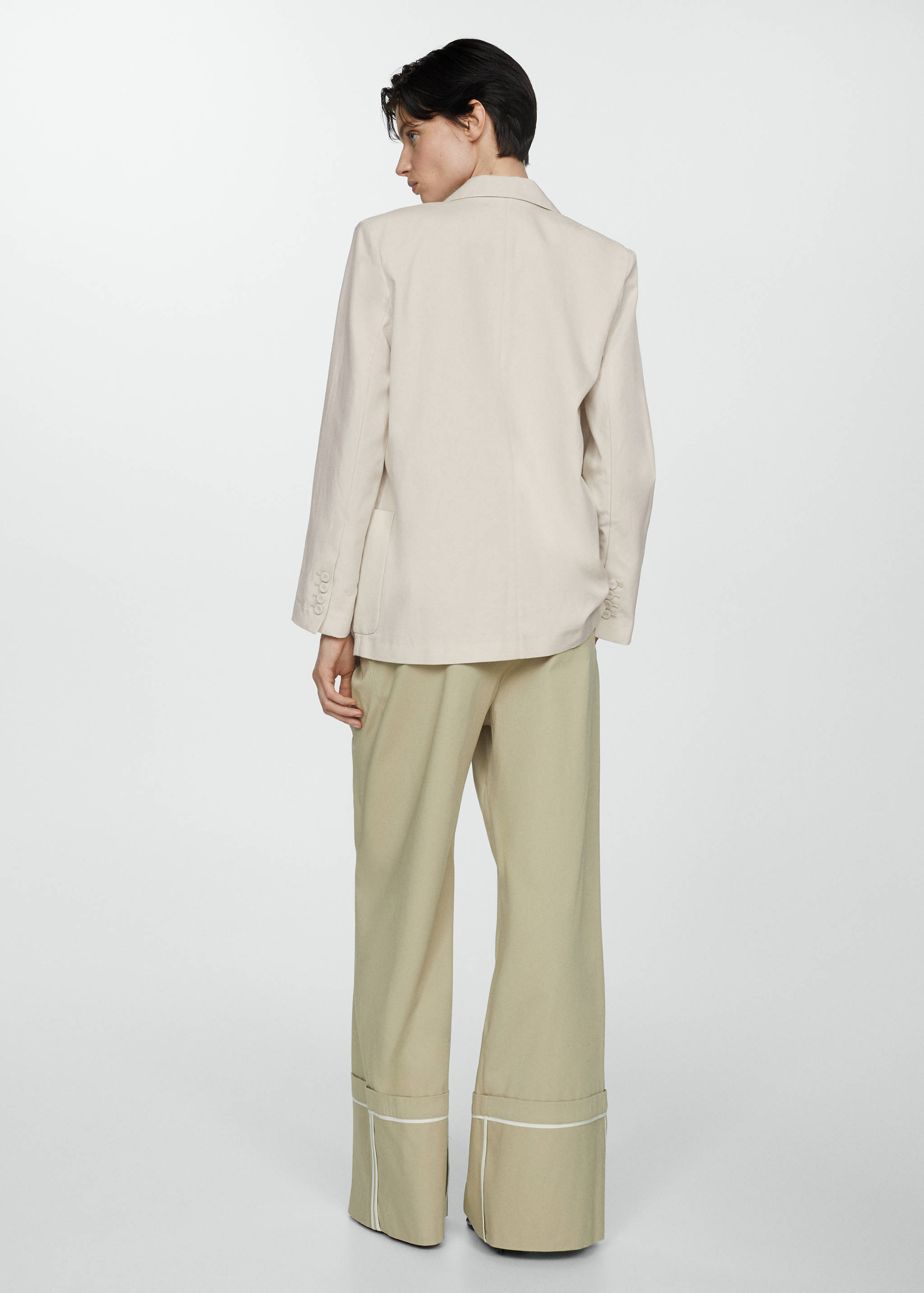 Americana traje bolsillos - Reverso del artículo