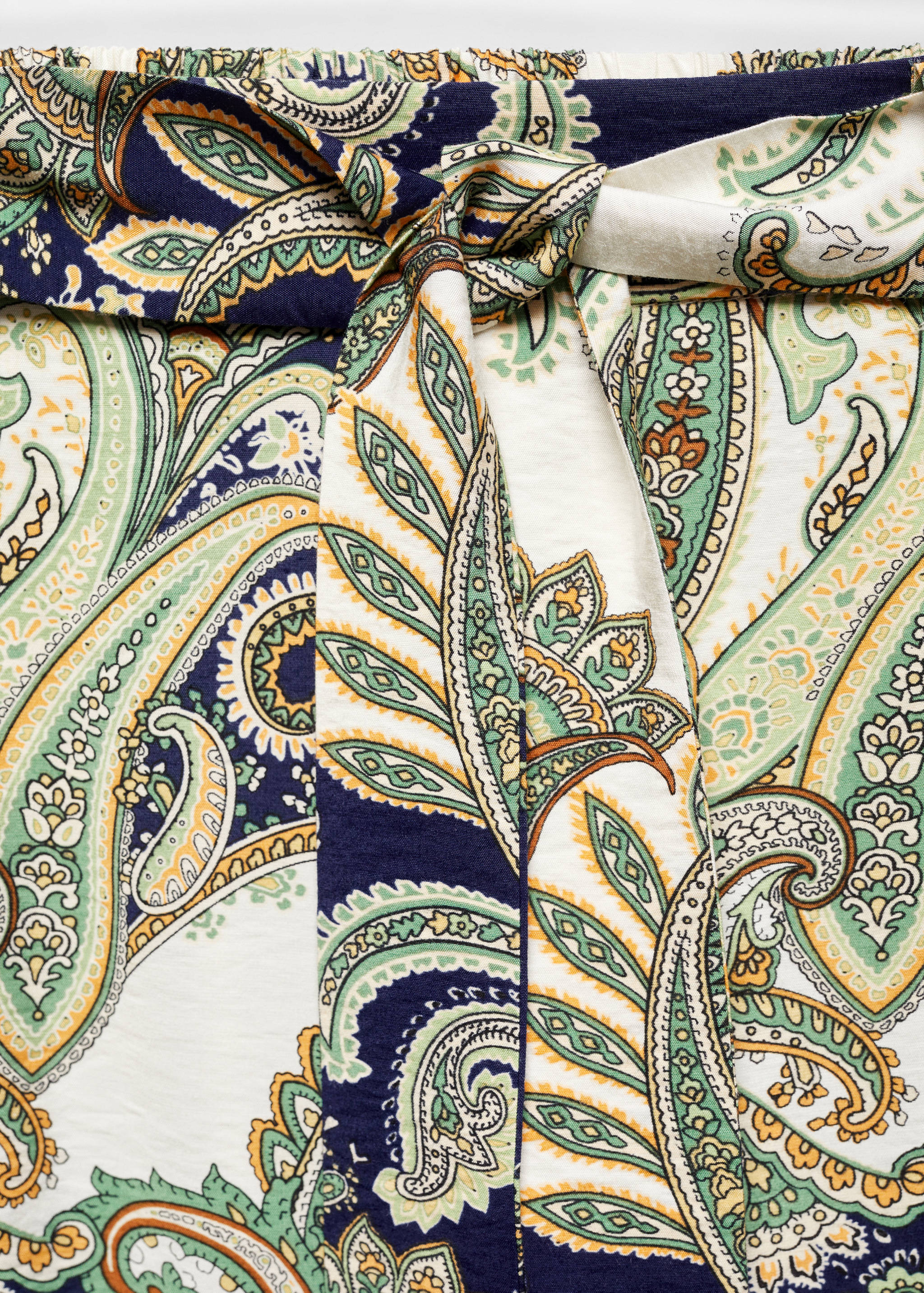 Gemusterte Hose mit Schleife - Detail des Artikels 8